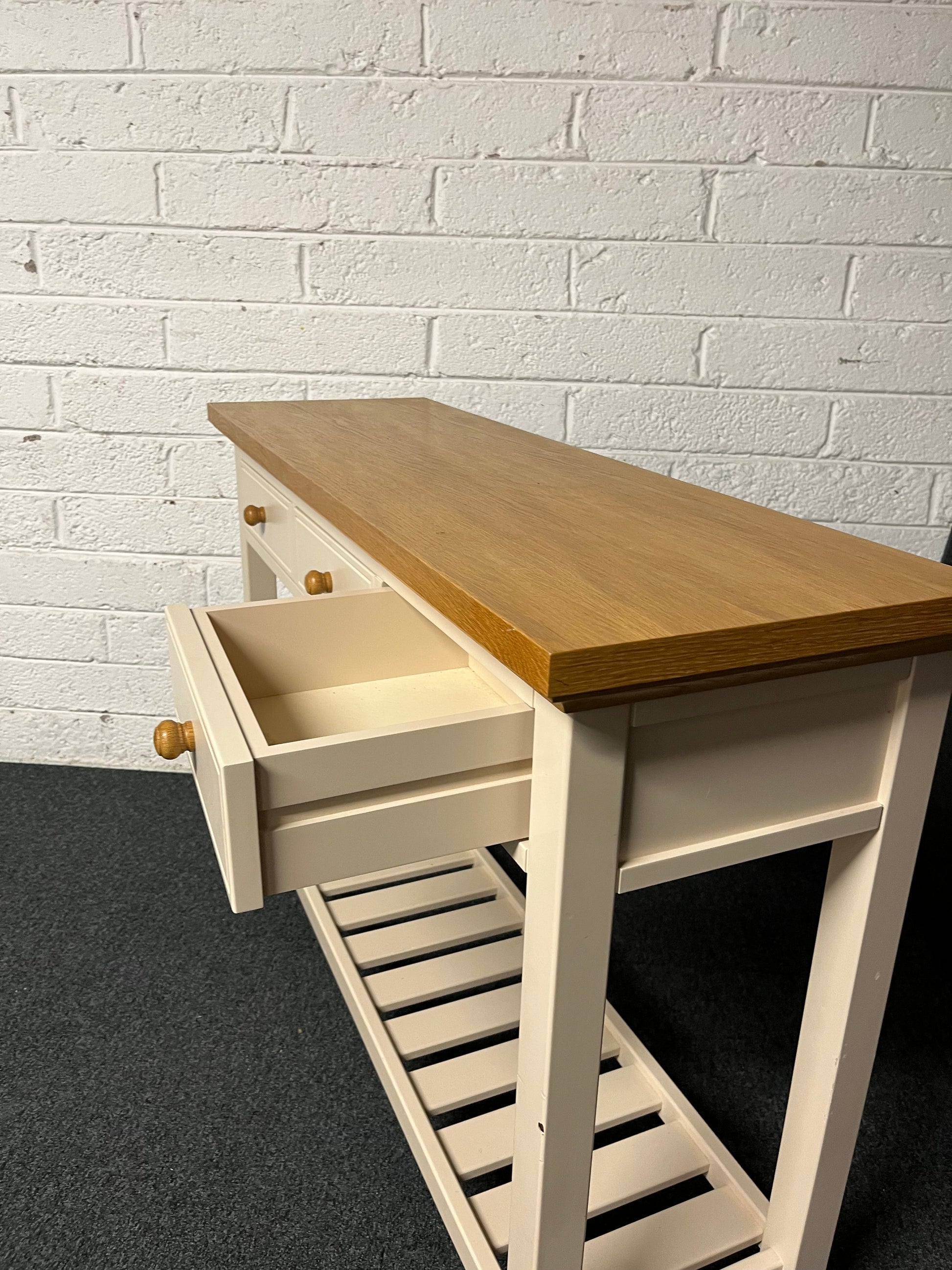Solid oak top slim console table with cream painted frame, 3 drawers and shelf  1225