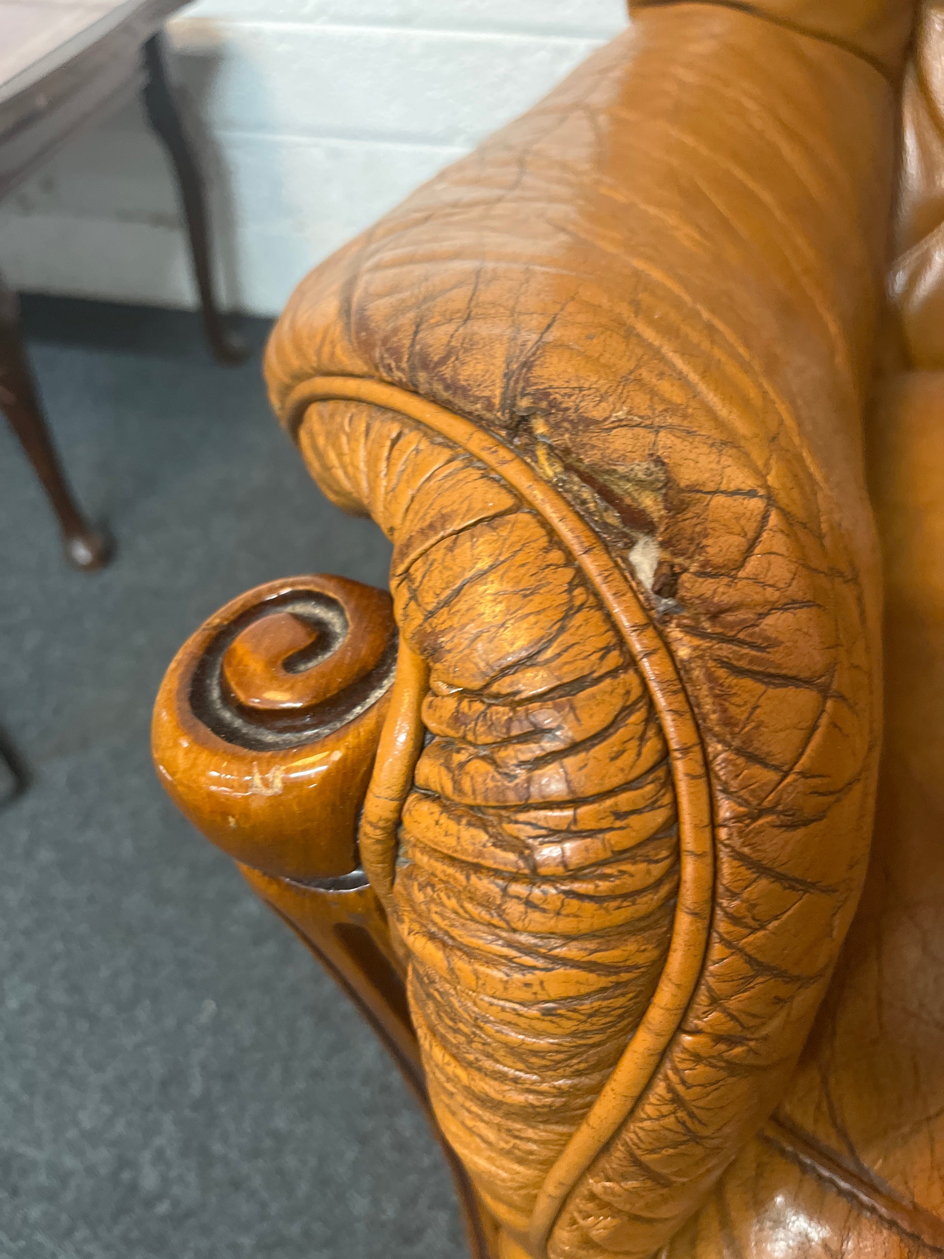 Real tan leather armchair with oak frame