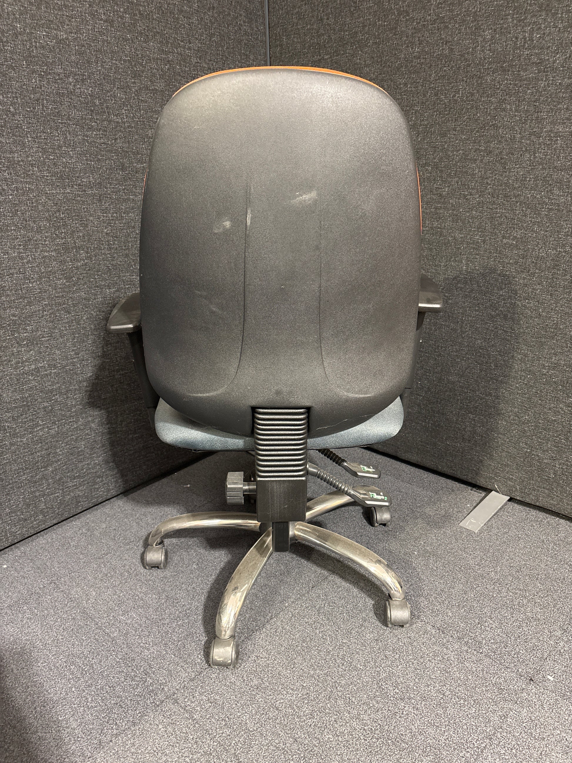 Two tone orange and grey high back swivel chair with height adjustable arms