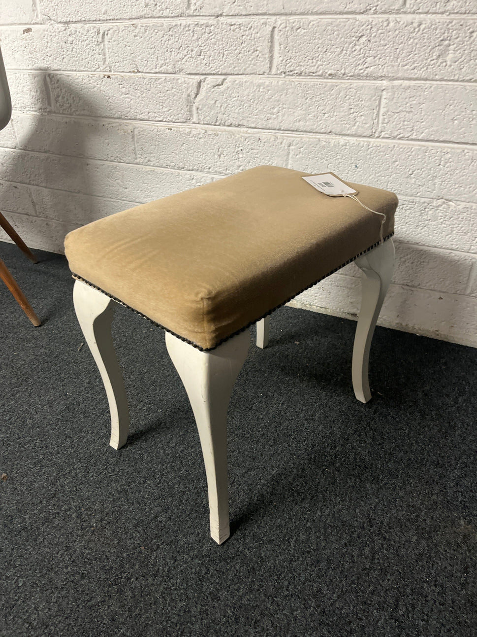 Brown fabric footstool with white legs  1225