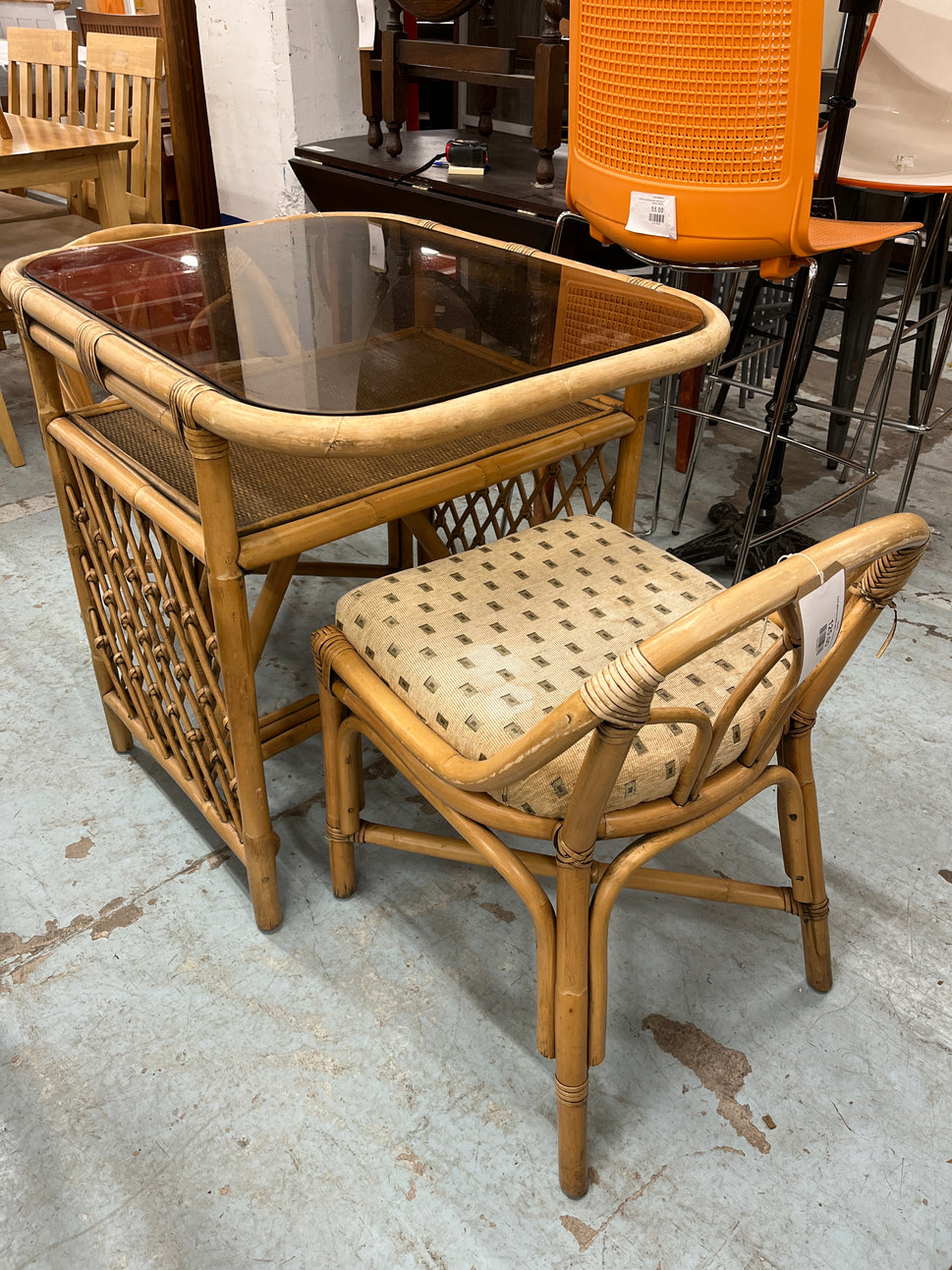 Cane glass top table with 2 matching chairs 2125