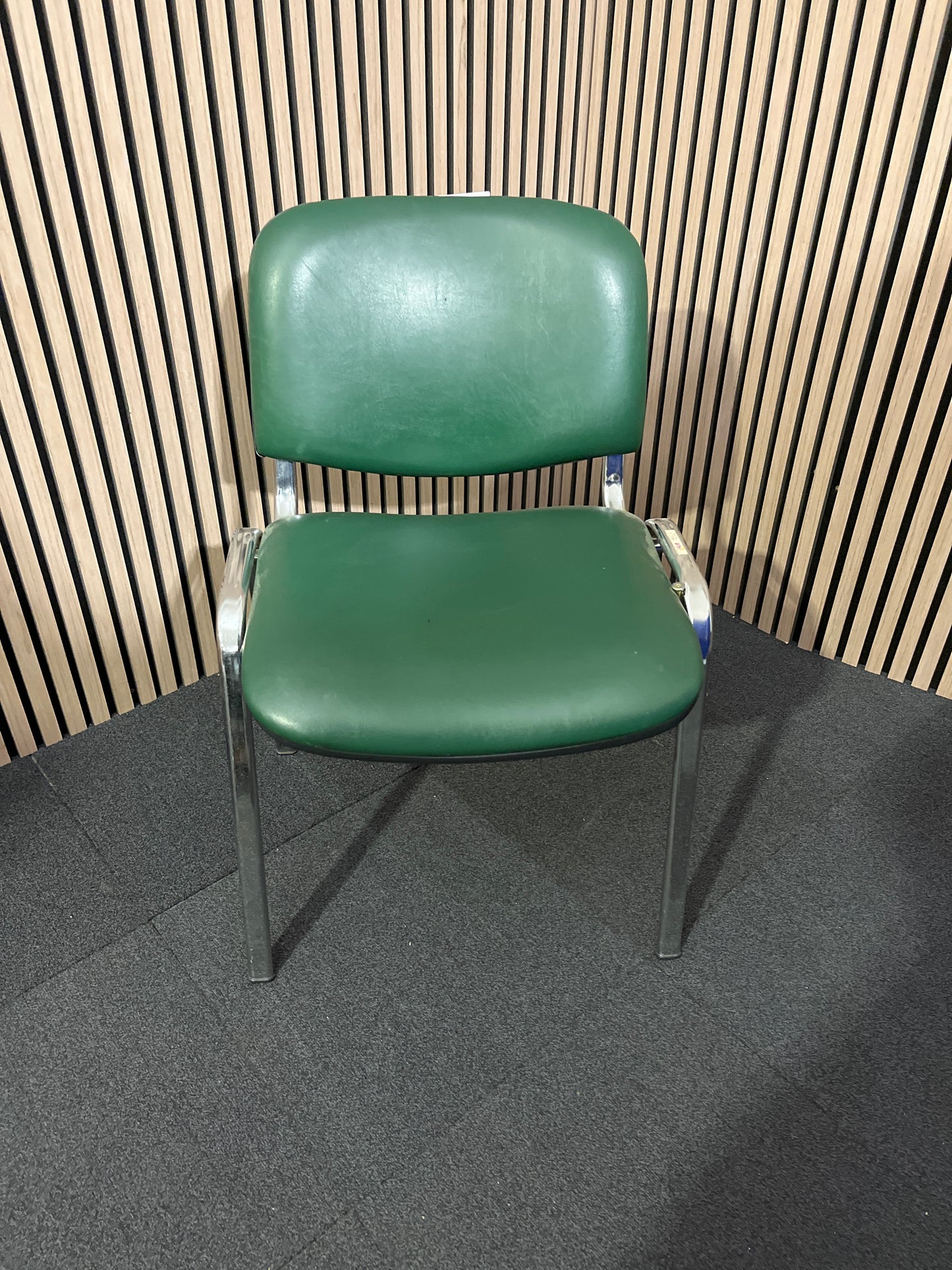 Green vinyl stacking meeting chair, chrome frame