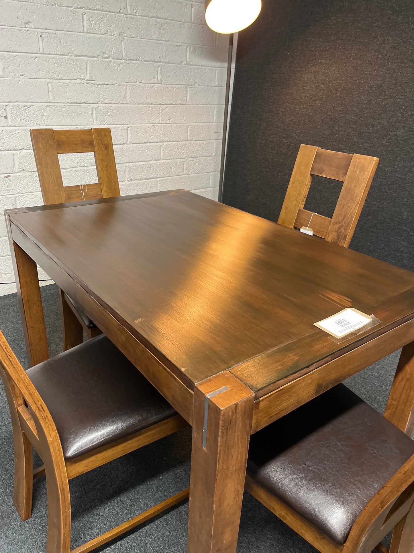 Solid  dark wood stained kitchen table (W 1200 x L 750 mm) with 4 no. solid wood chairs with black leatherette seat cushion 1225