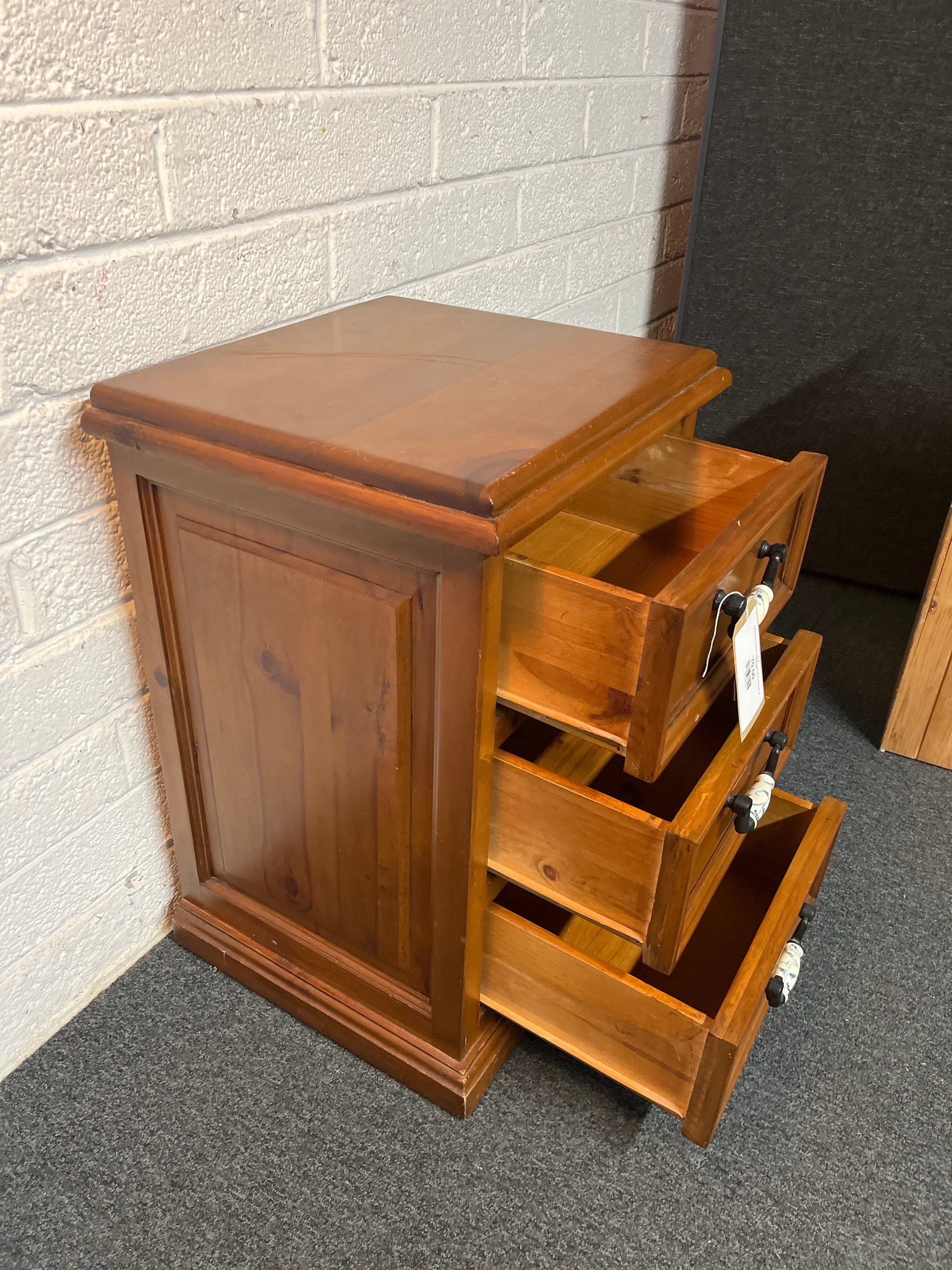Stained pine 3 drawer bedside locker (H 75 x W 78 xD  44 cm) 2225