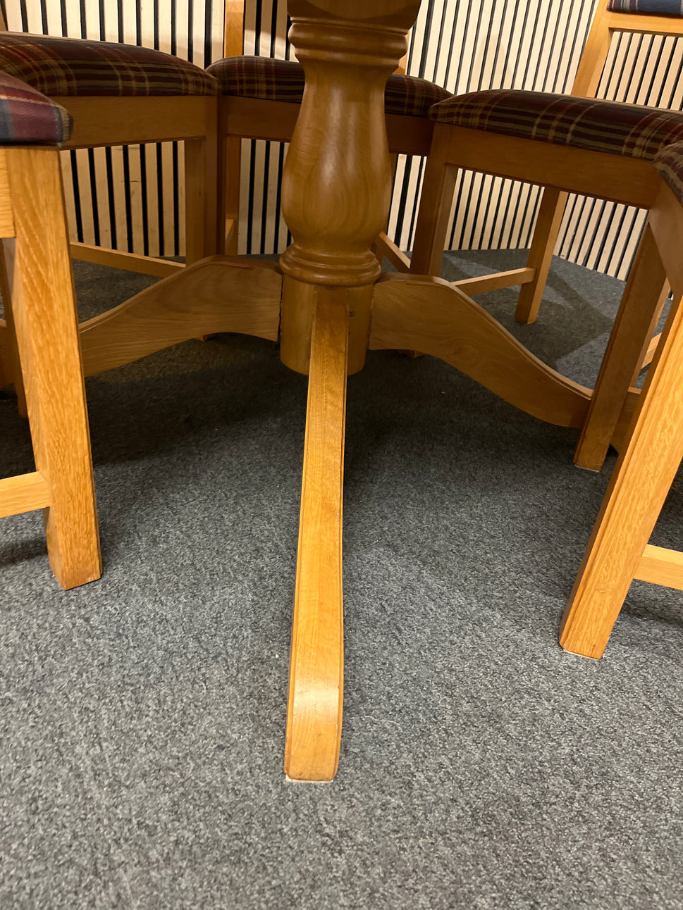 Round light oak table central base with five matching tartan upholstered chairs. (135 cm in diameter)  44285