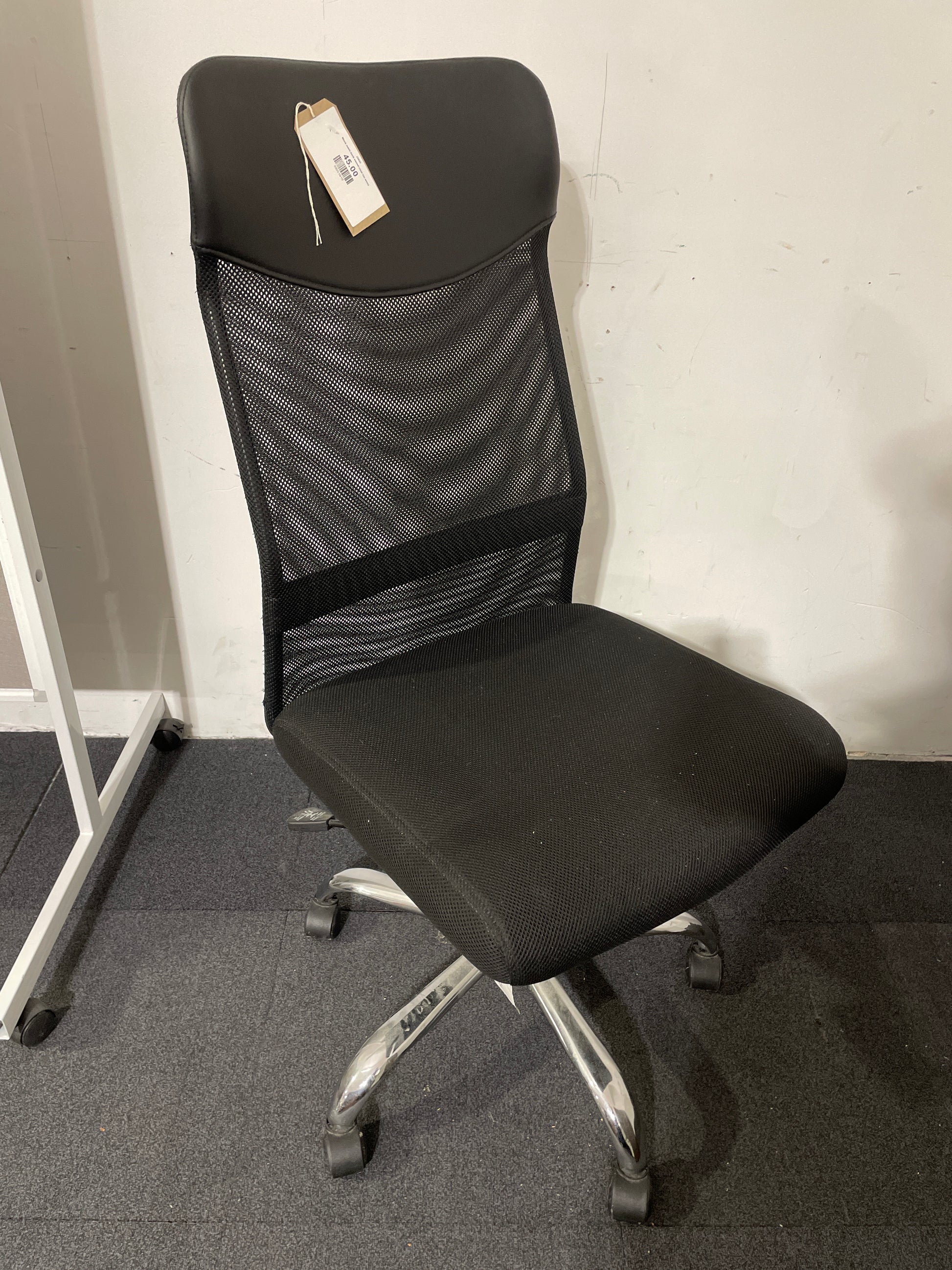 Black mesh back swivel chair (no arms)
