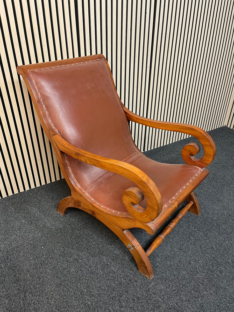 Ornate solid dark wood stained occasional armchair with brown leather studded seat 2425
