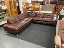 Large brown leather corner sofa in sections with chrome legs  44538