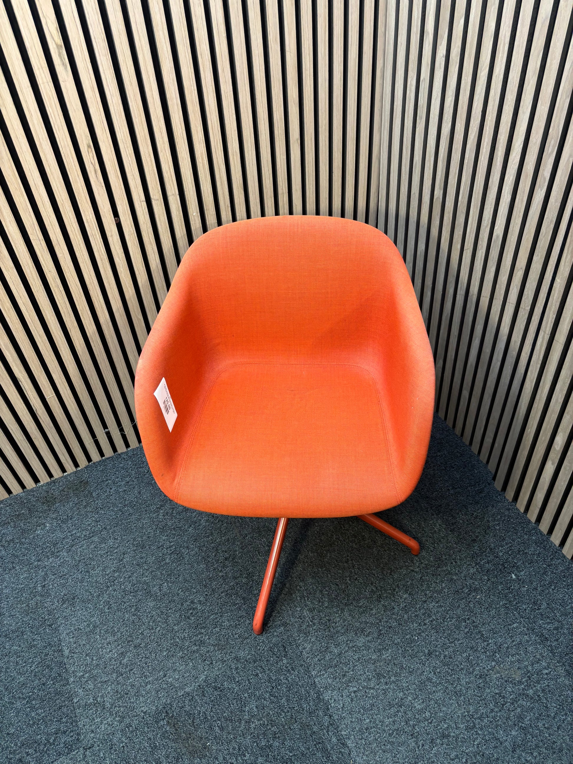 Muuto fibre armchair with a swivel base in manner 2 fabric with red painted metal spider base   J3911