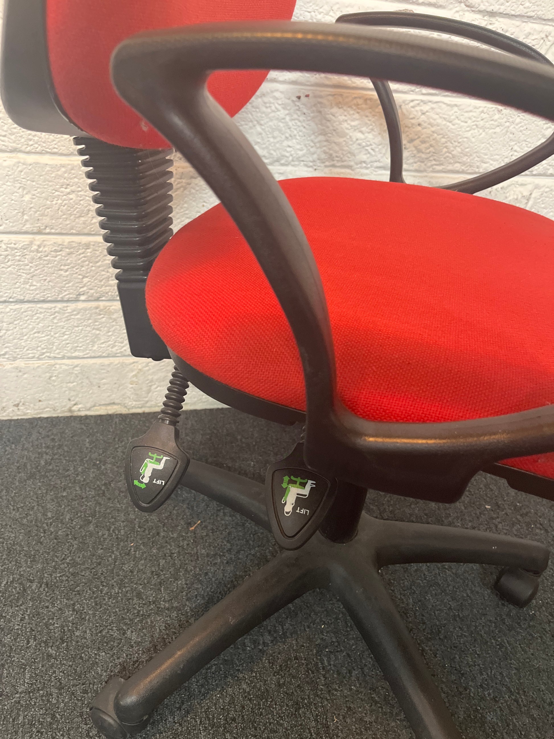 Red fabric swivel chair with black loop arms 1325