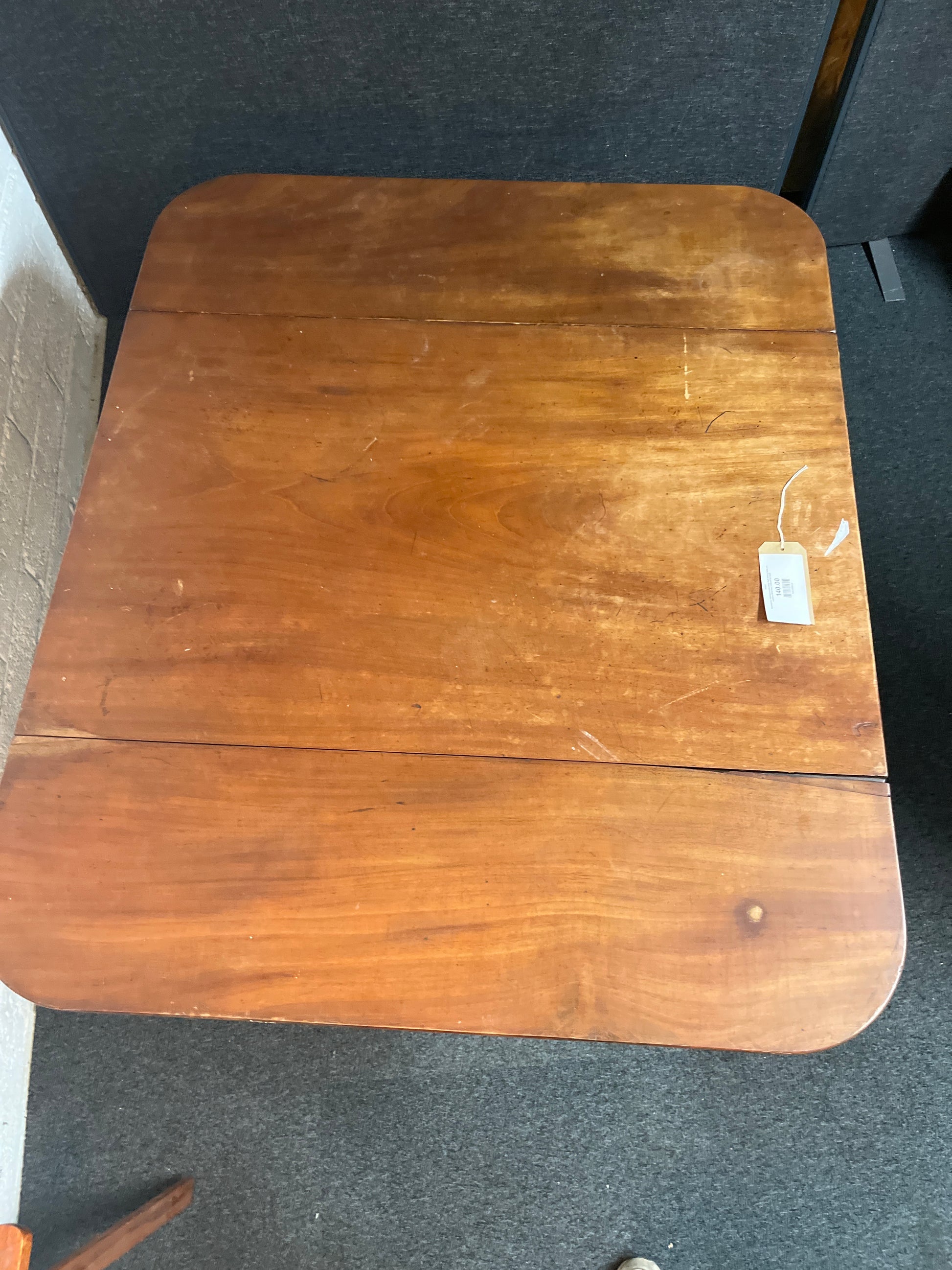 Mahogany stained ornate drop leaf dining table on castors W1270xL1250xH730 3225