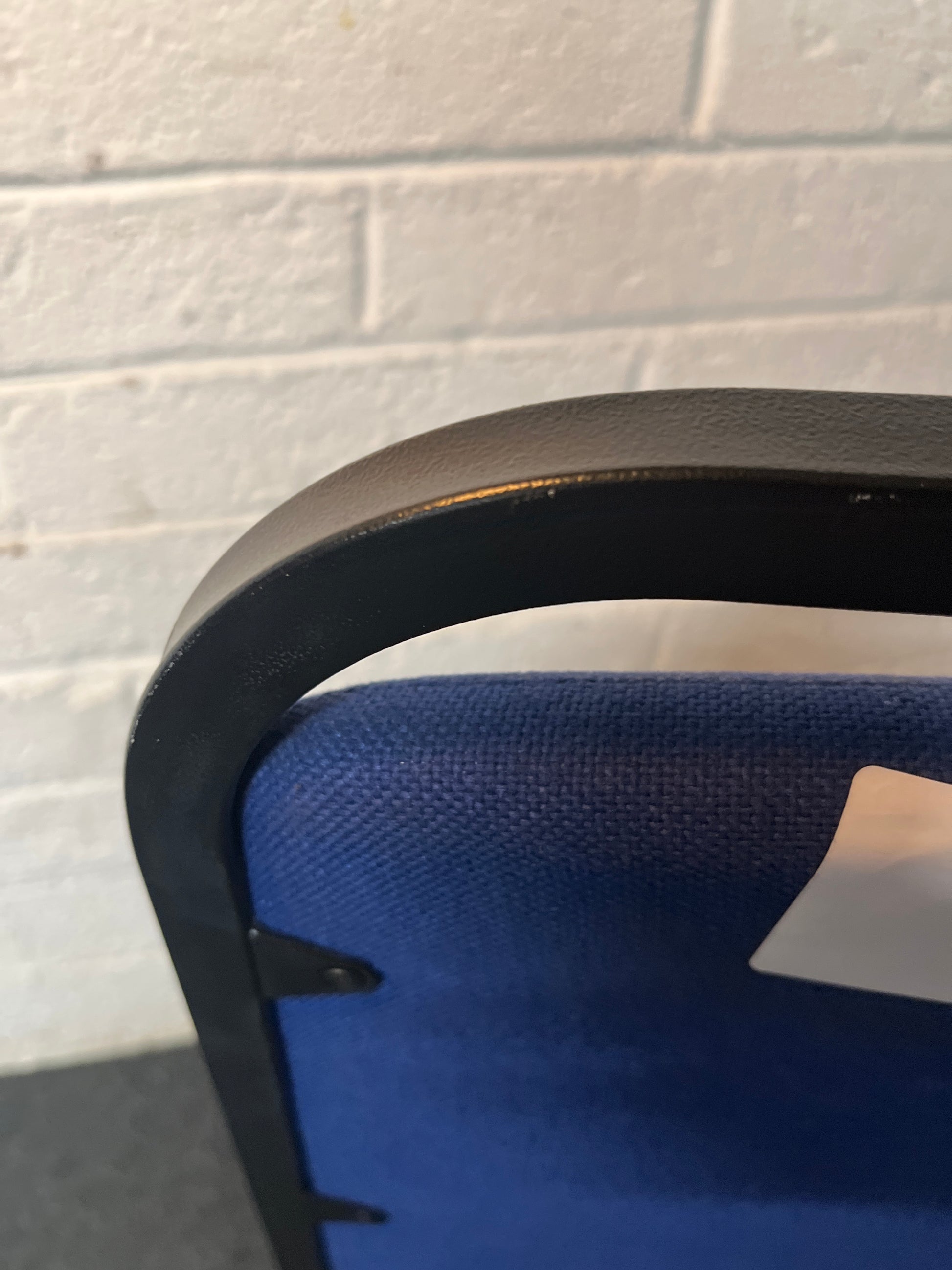 SECONDHAND black metal blue fabric stacking chair