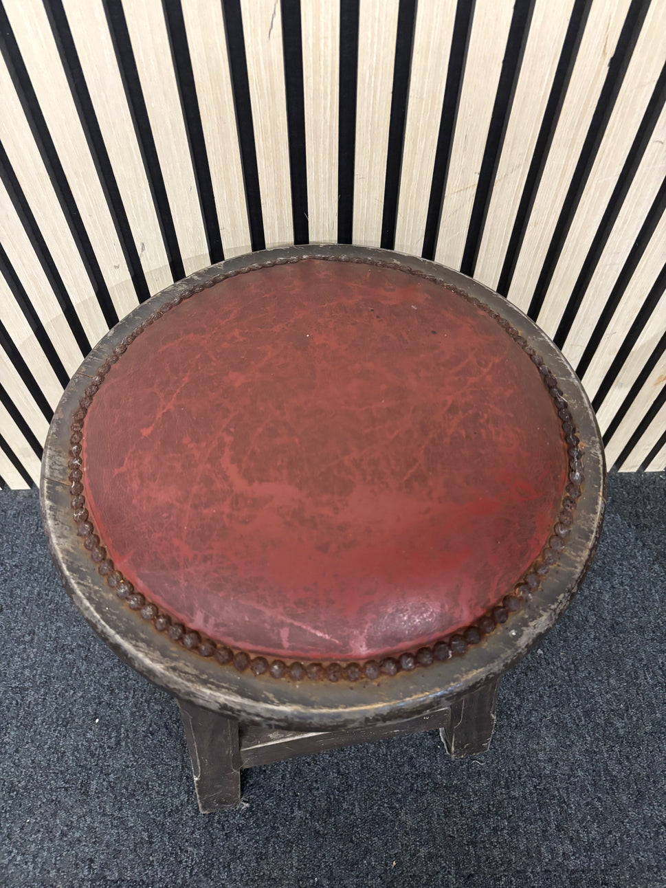 Solid darkwood low pub stool with red leatherette seat and button detailing 43685