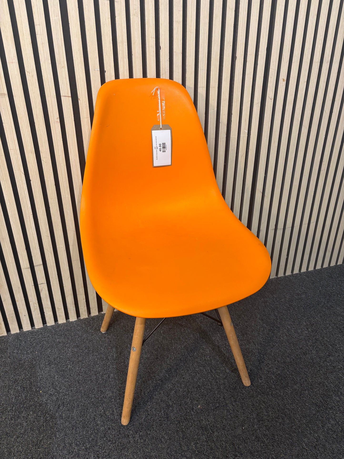 Moulded orange plastic kitchen chair with metal legs  44047
