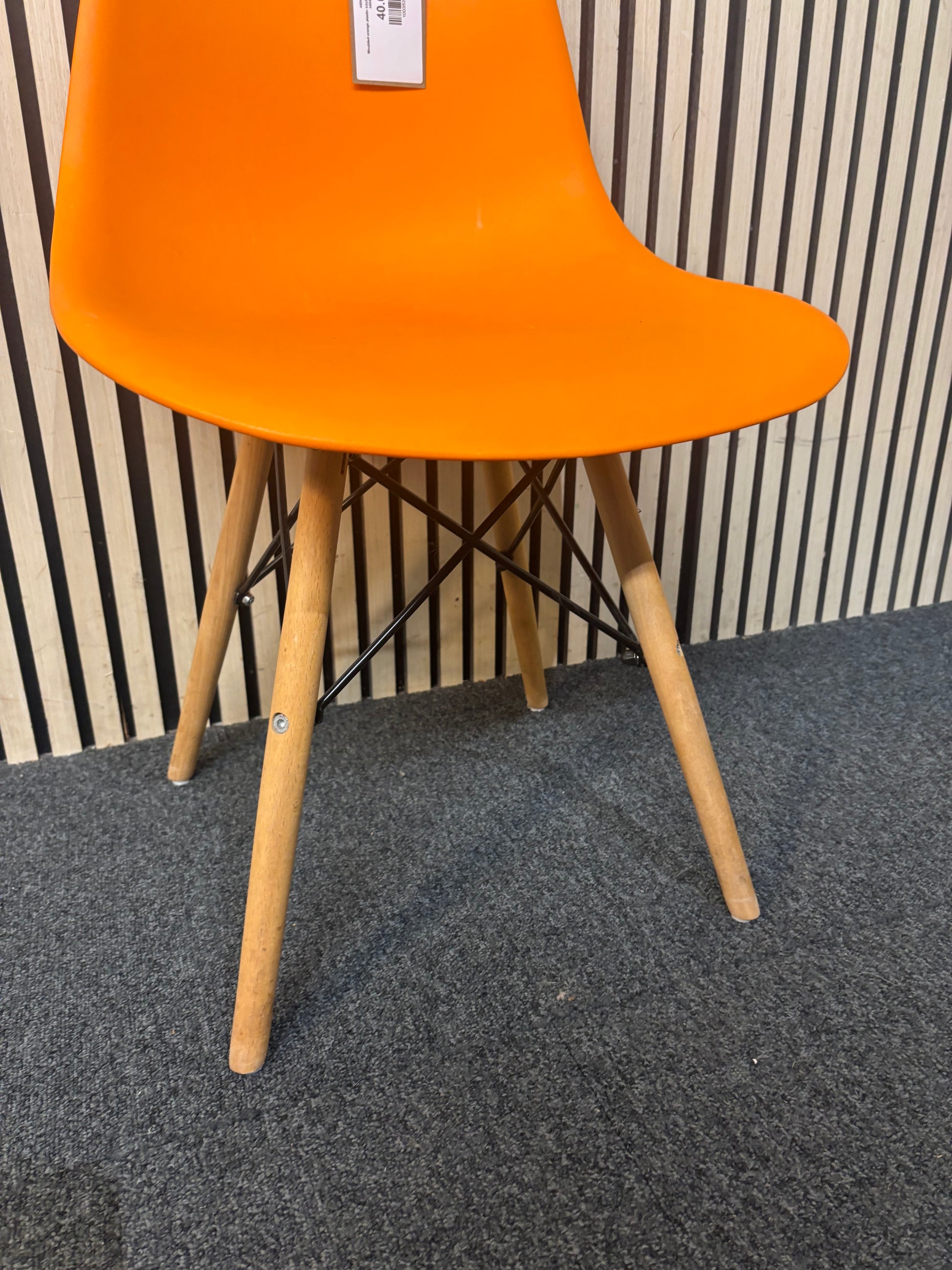 Moulded orange plastic kitchen chair with metal legs  44047