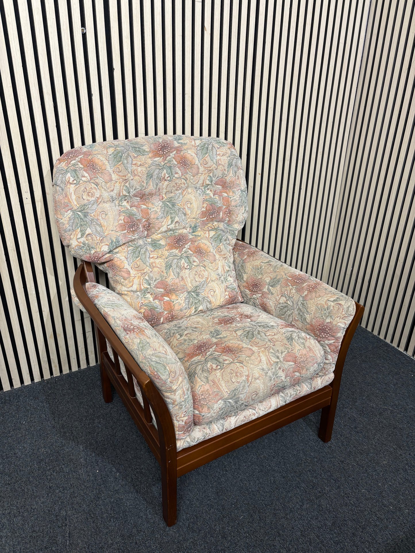 Traditional floral patterned armchair with solid dark wood frame  44228