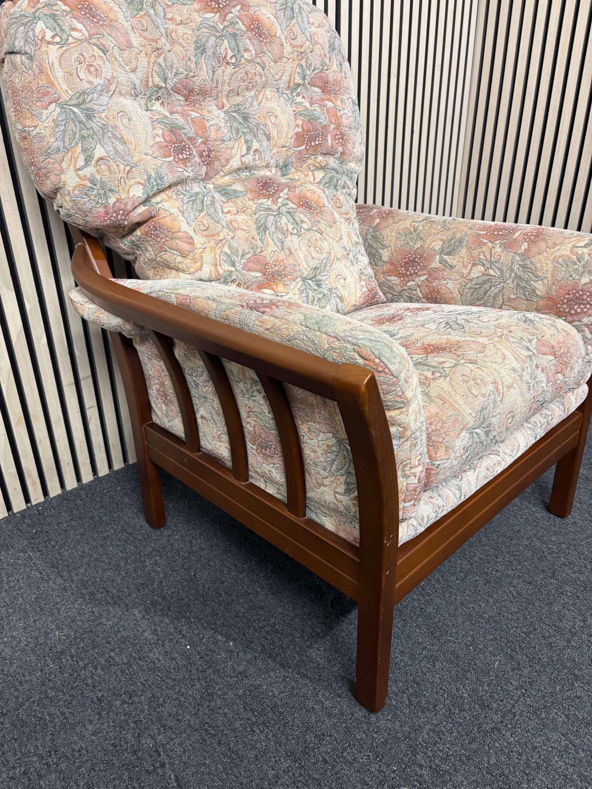 Traditional floral patterned armchair with solid dark wood frame  44228