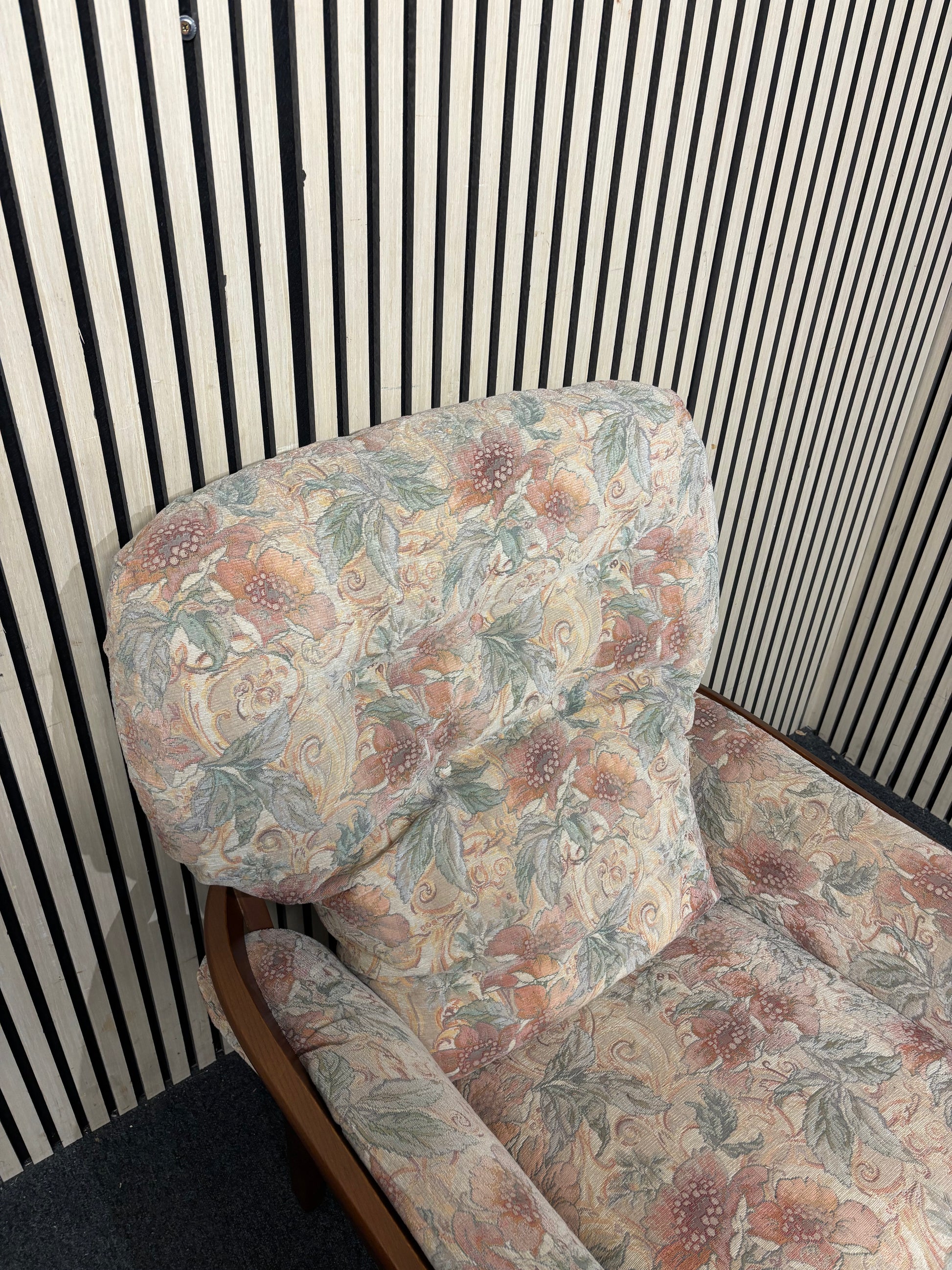 Traditional floral patterned armchair with solid dark wood frame  44228