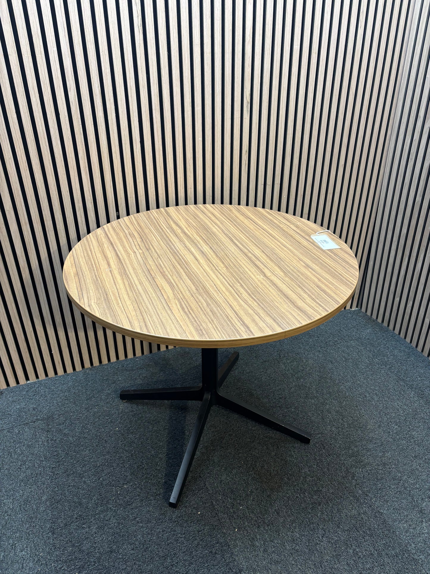 Round cafe table with wood-effect top and black metal base.  J3943