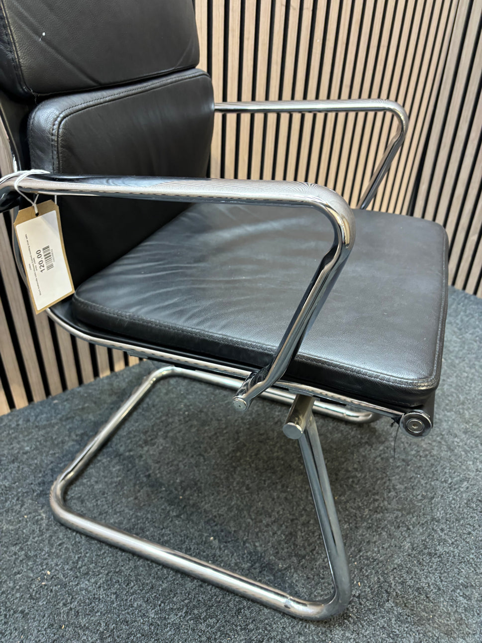 Black leatherette solid chrome framed meeting chair with arms  J3944