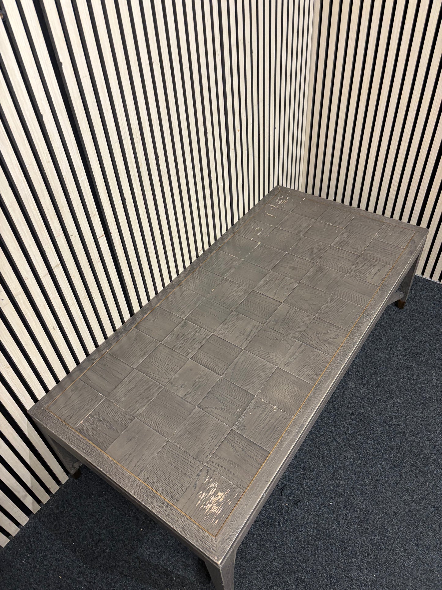 Grey-washed rectangular coffee table with parquet top and metal accents. (H 43 x W 140 x D 68 cm)  44352