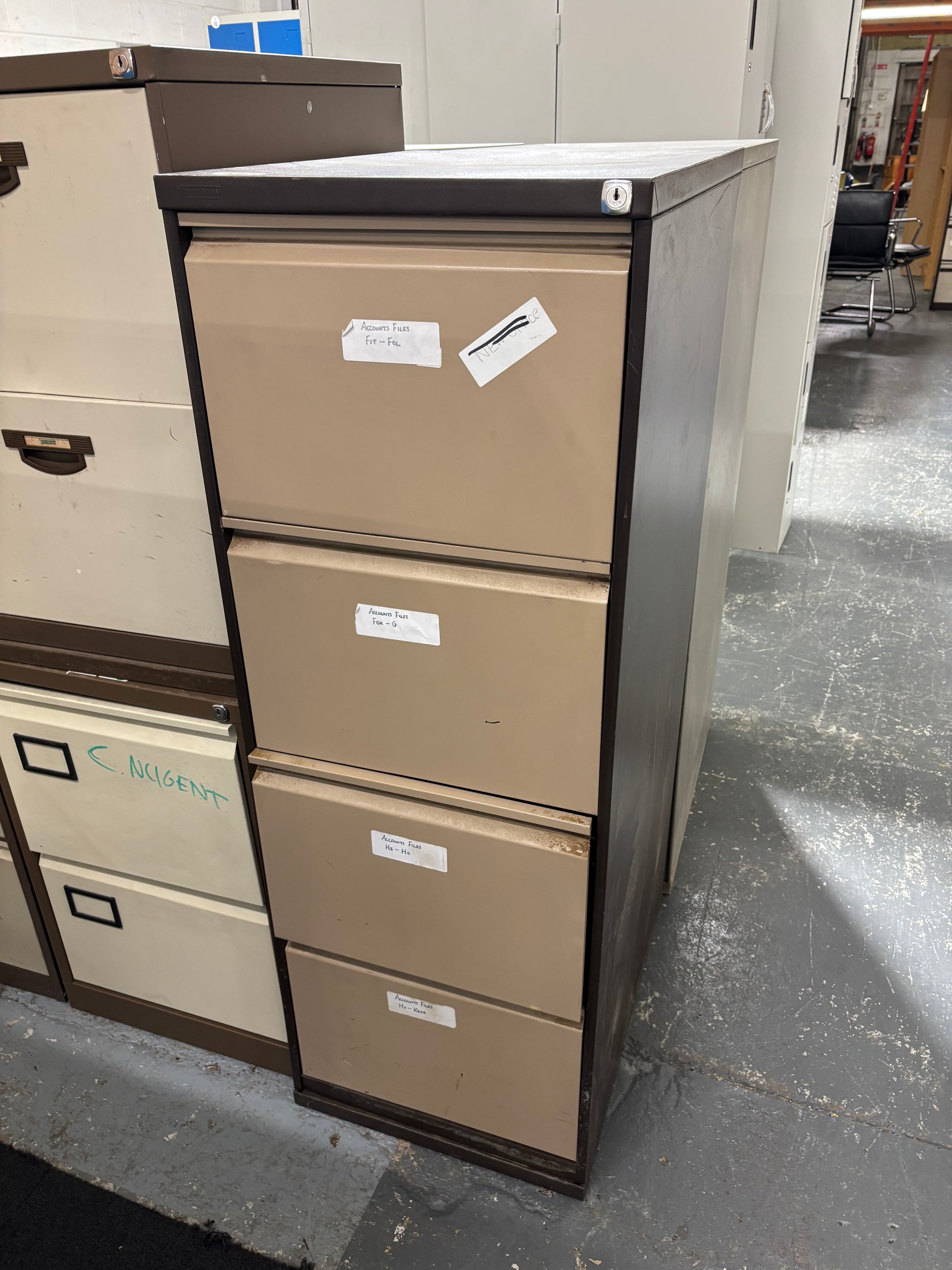 Tall 4 drawer metal filing cabinet  J3953