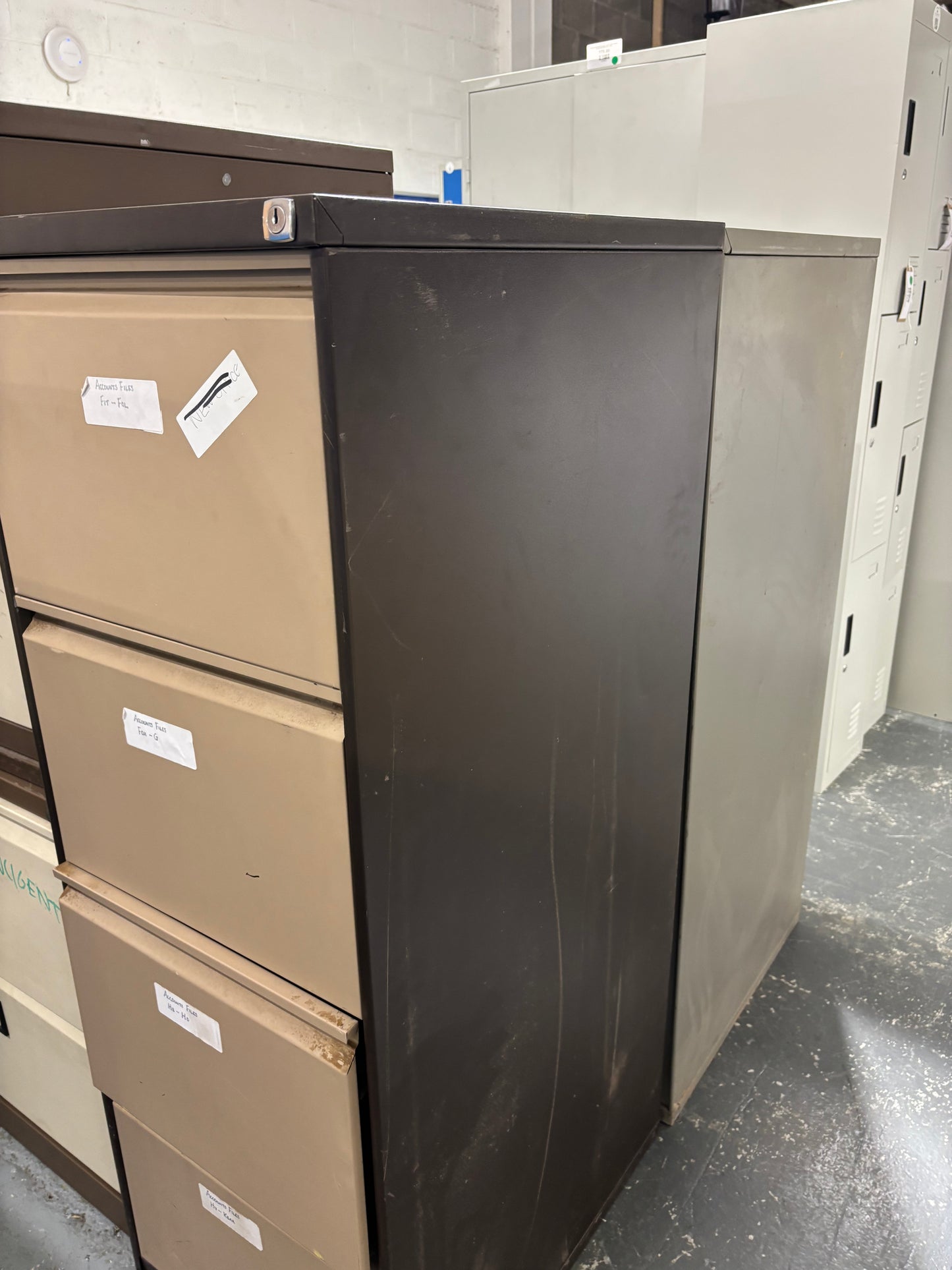 Tall 4 drawer metal filing cabinet  J3953