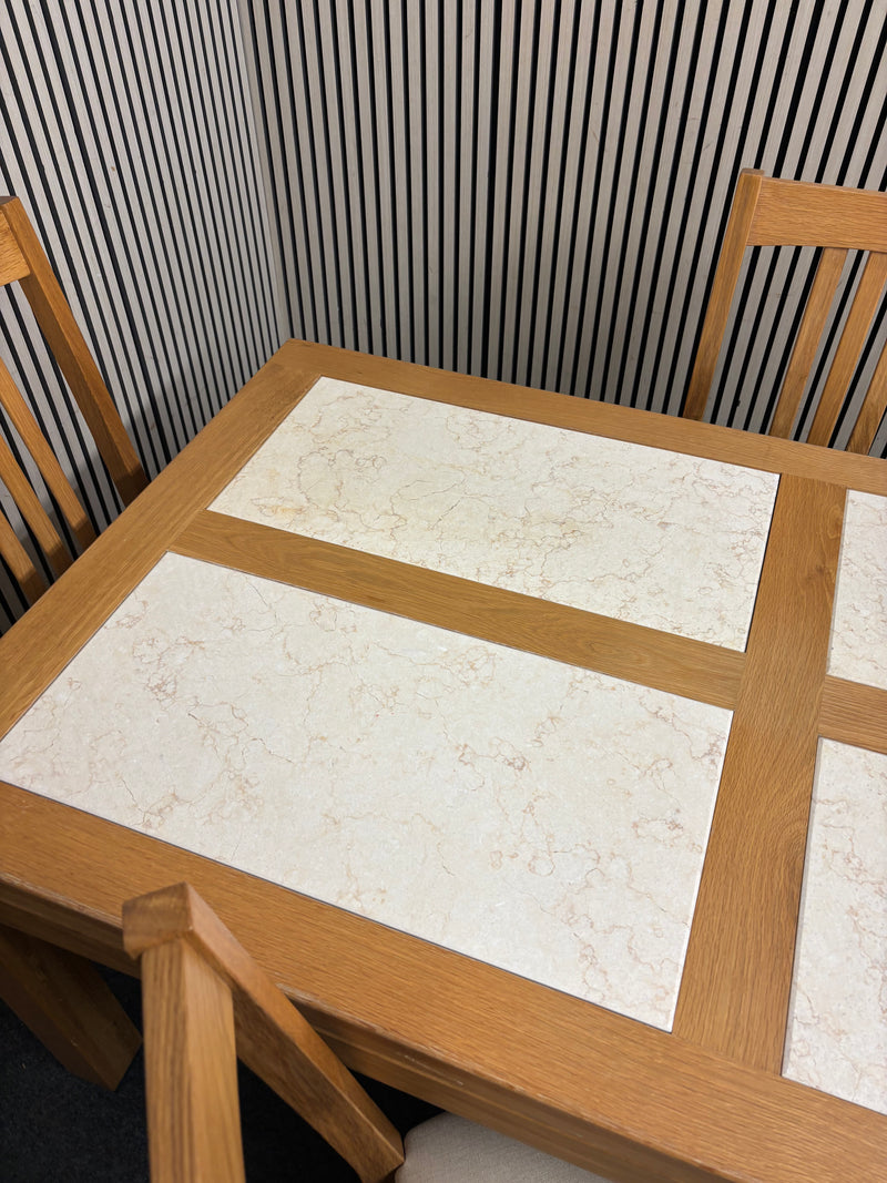 Solid oak rectangular dining table featuring cream marbled tile insets & 4 Dining Chairs  44442