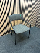 Charcoal fabric meeting chair with solid black metal frame