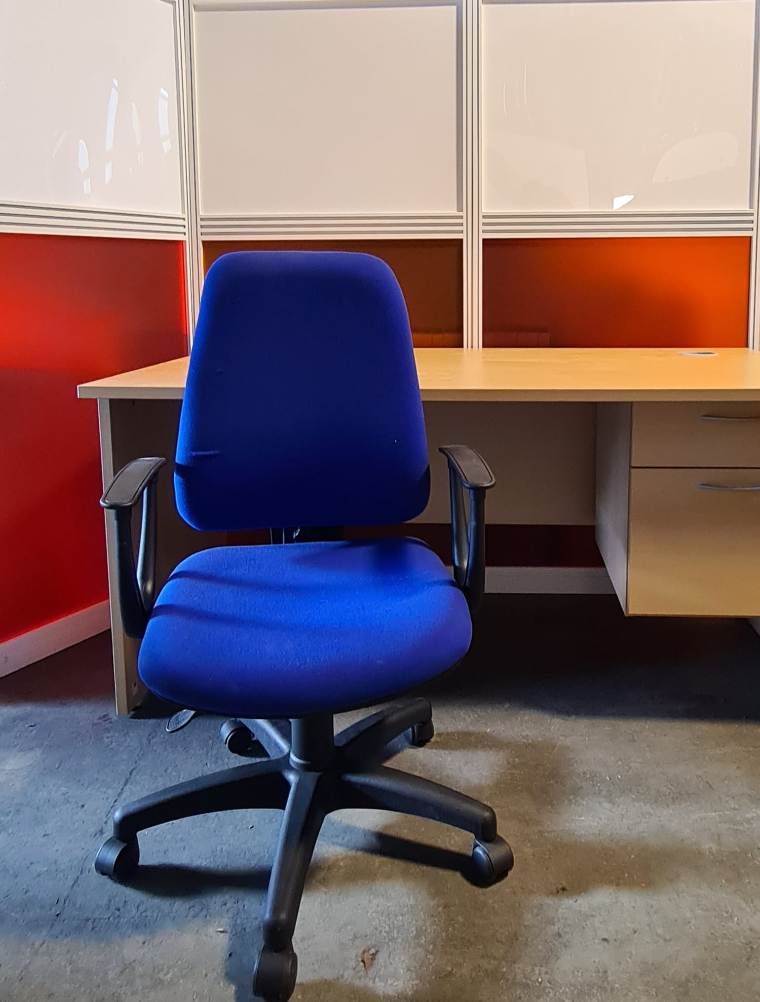 High back blue fabric swivel chair with black loop arms