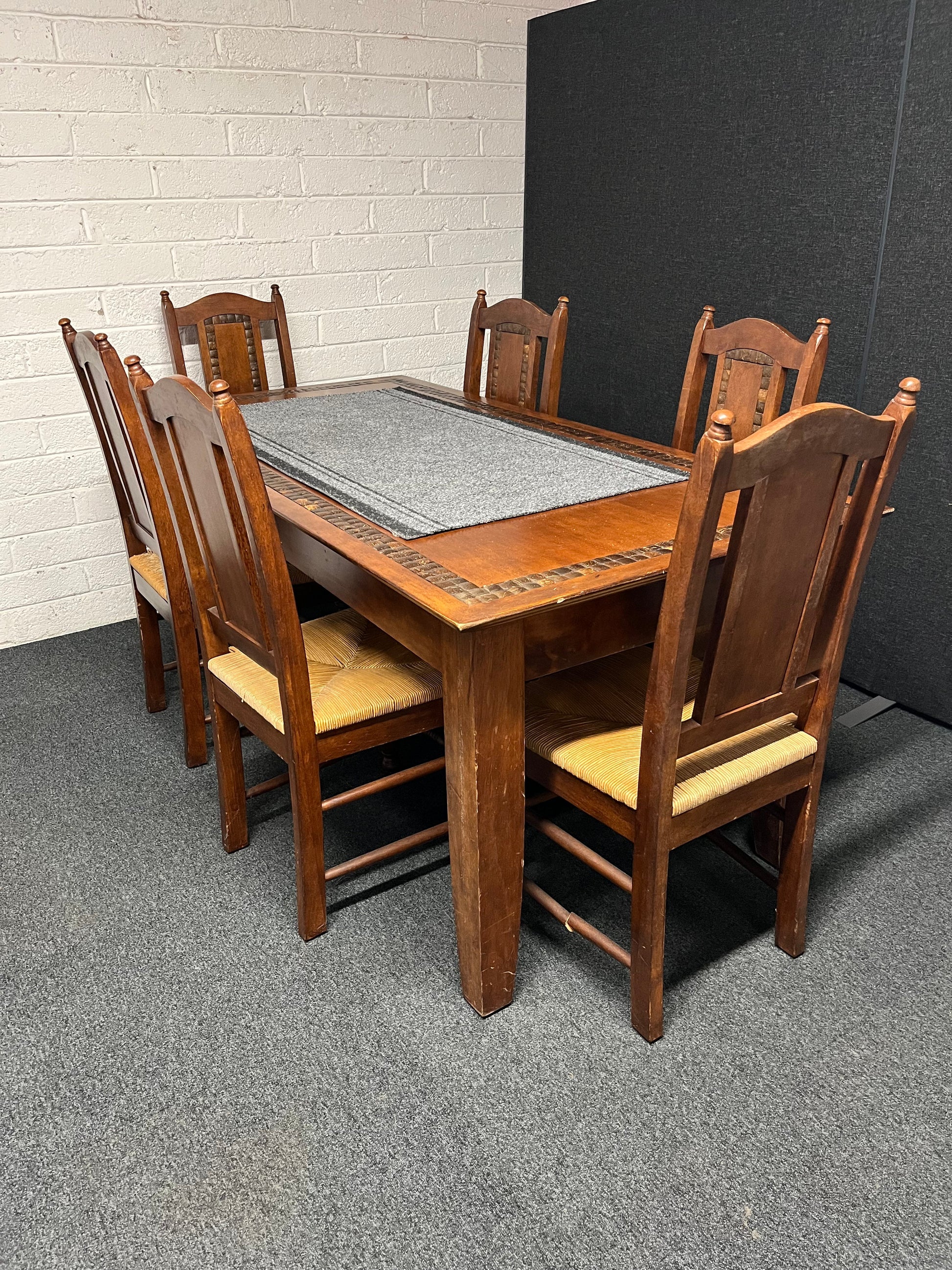 Dark wood stained large kitchen table 90Wx1830L cm with tiled details and 6 no. matching chairs with rattan seat 2225