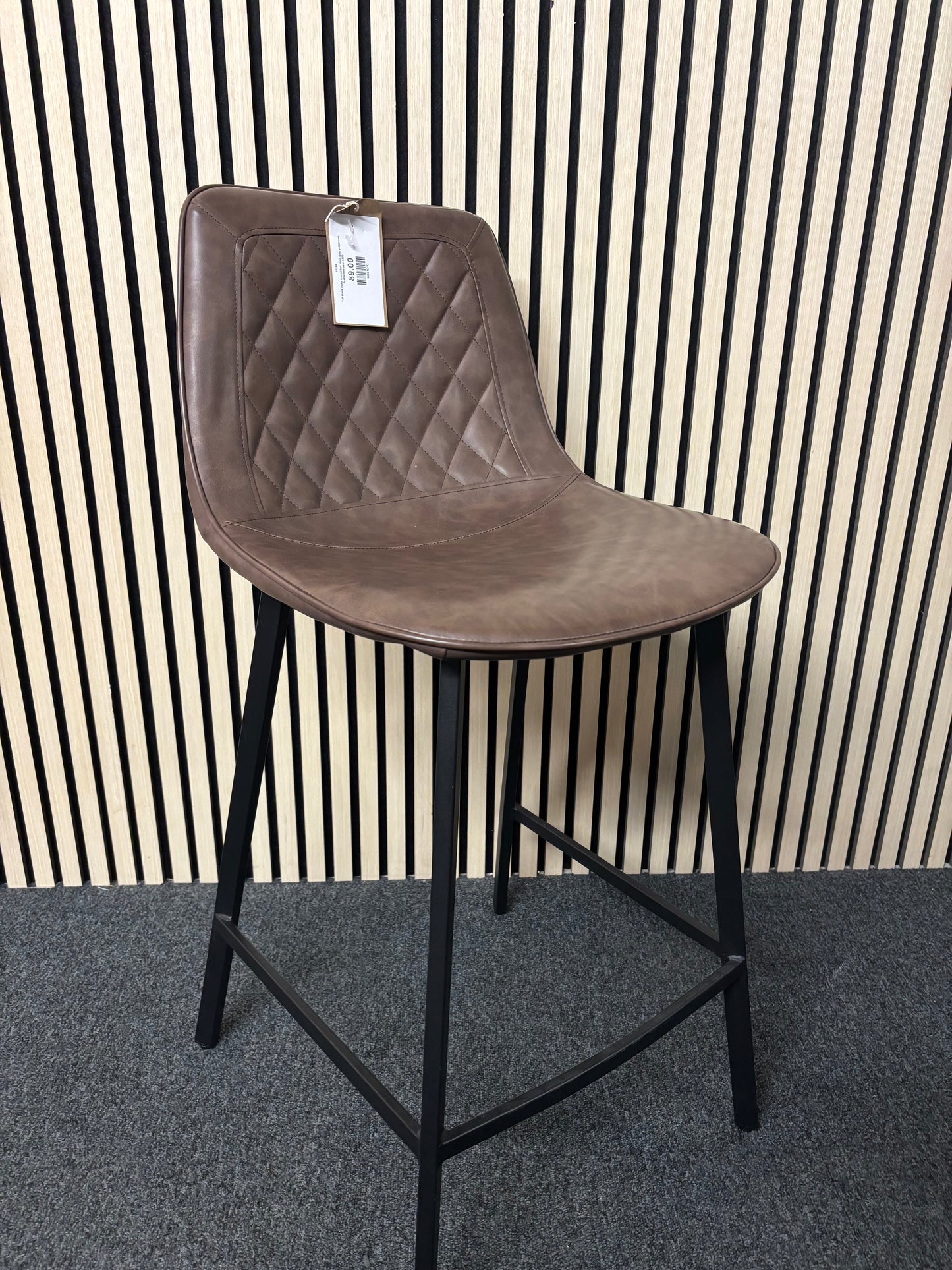 Tall black metal framed bar stool with soft brown leatherette seat 2325
