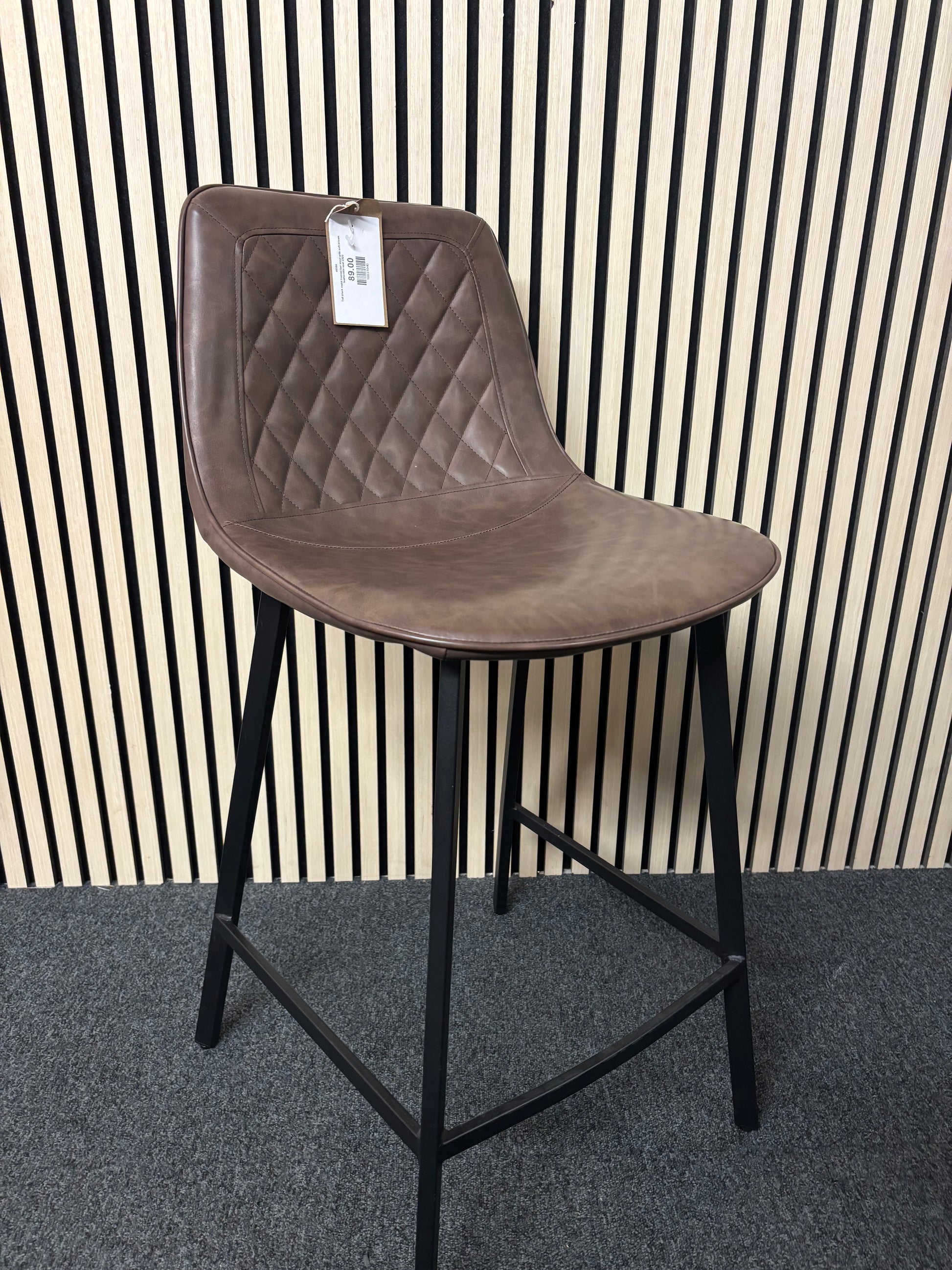 Tall black metal framed bar stool with soft brown leatherette seat 2325