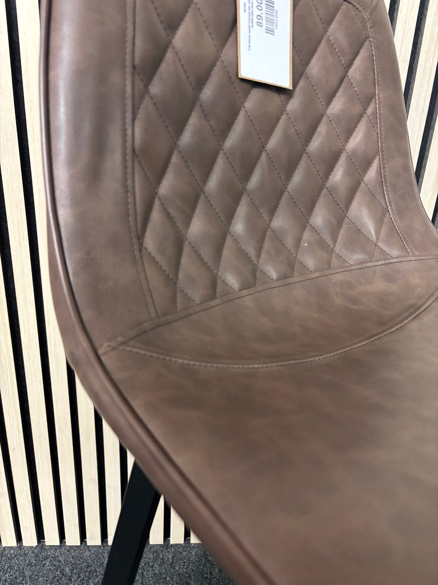 Tall black metal framed bar stool with soft brown leatherette seat 2325