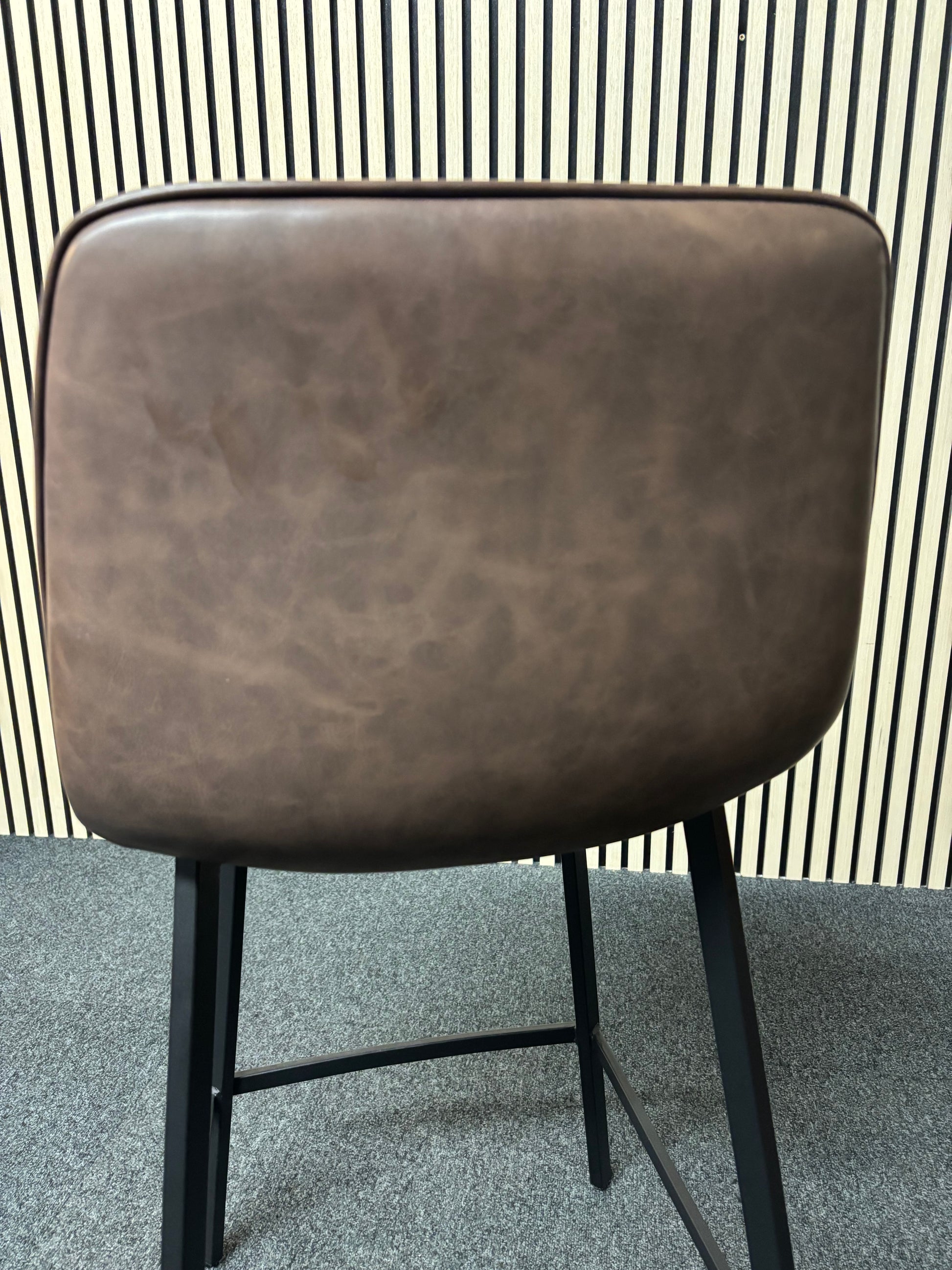 Tall black metal framed bar stool with soft brown leatherette seat 2325