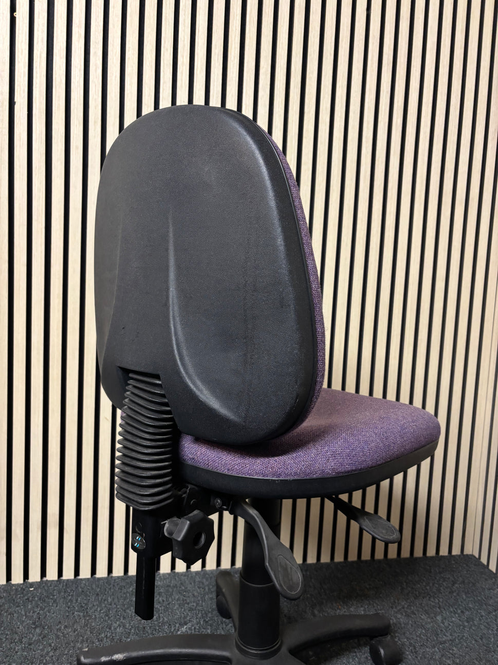 Purple fabric second hand swivel chair- no arms