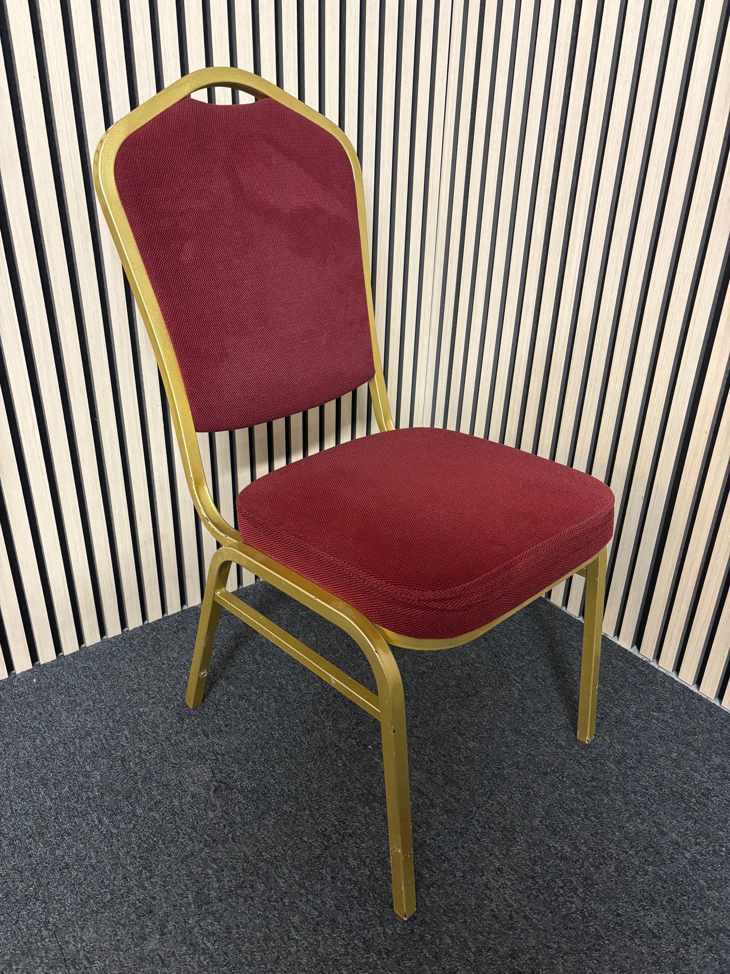 Solid metal framed gold effect red fabric banquet chair 2325