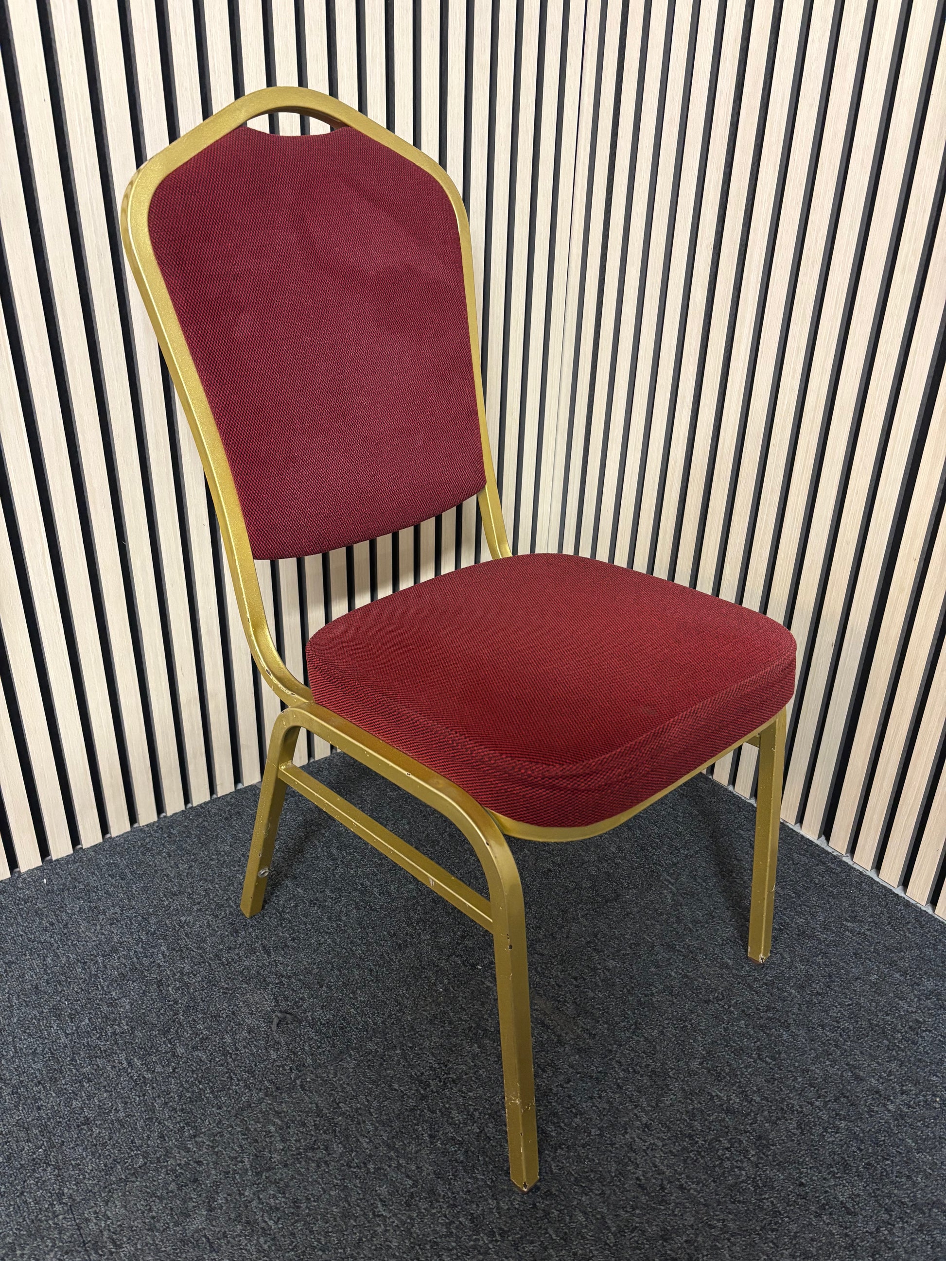 Solid metal framed gold effect red fabric banquet chair 2325