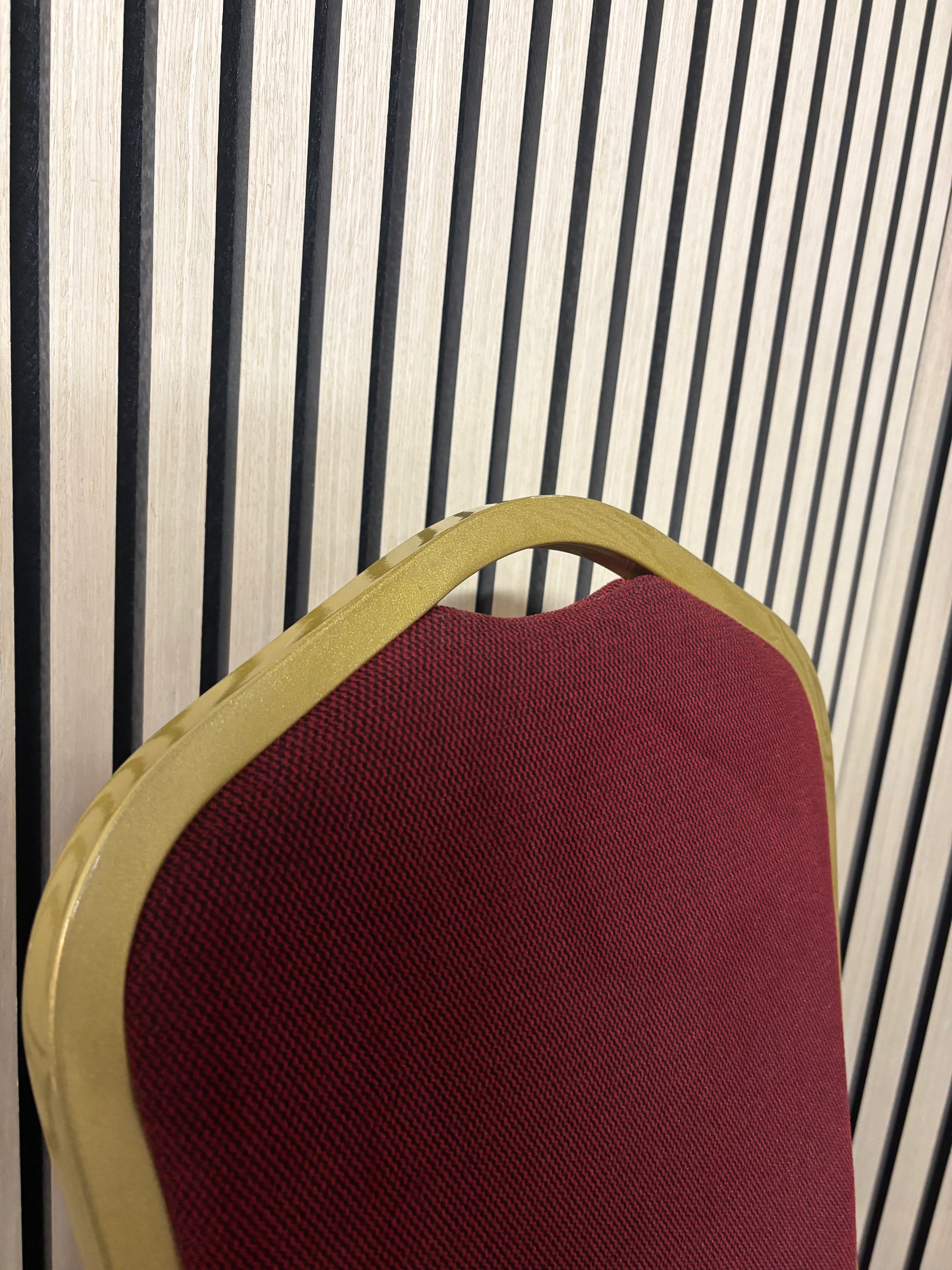 Solid metal framed gold effect red fabric banquet chair 2325