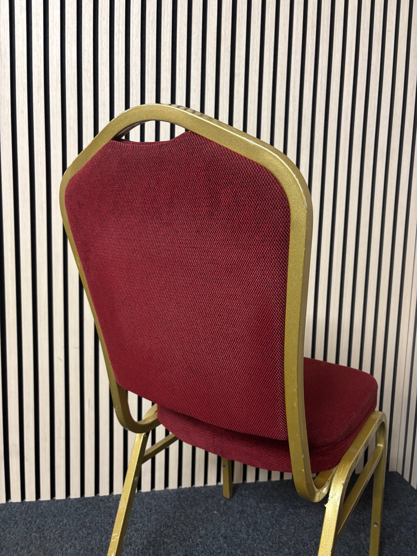 Solid metal framed gold effect red fabric banquet chair 2325