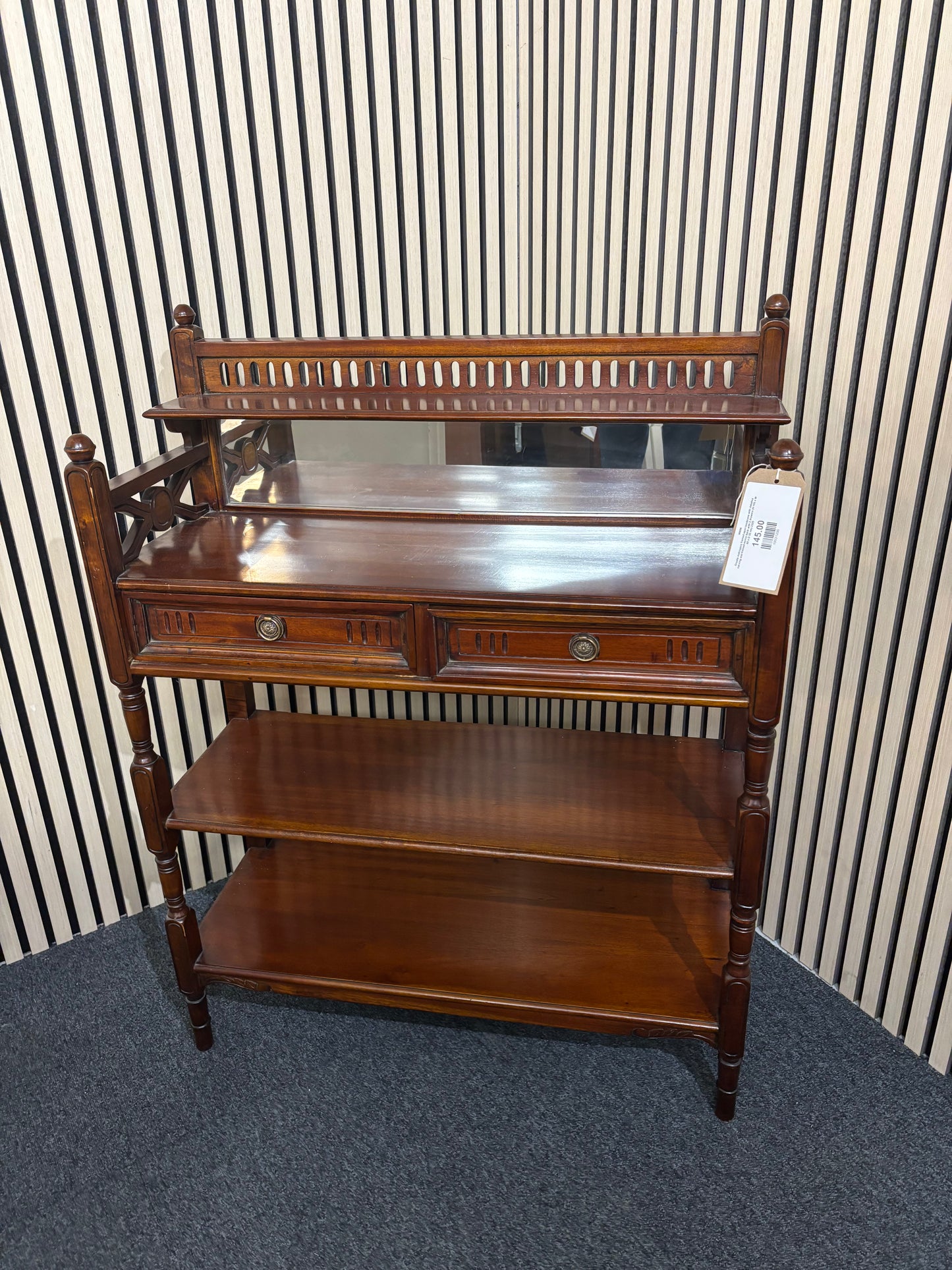 Ornate mahogany framed open bookcase with detailed carving and framed mirror back with 2 drawers (H 105 x W 80 x D 32 cm) 2325