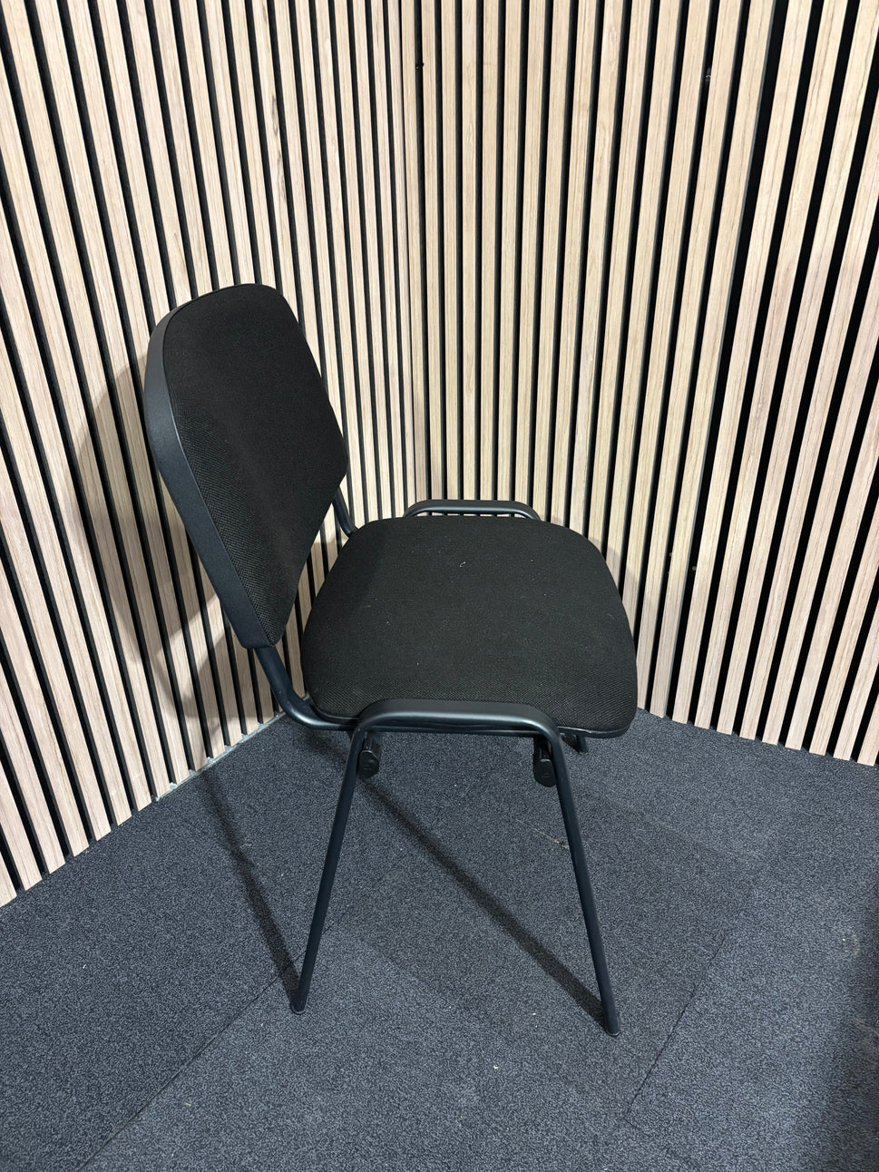 Black fabric plastic frame taurus stacking chair 2425