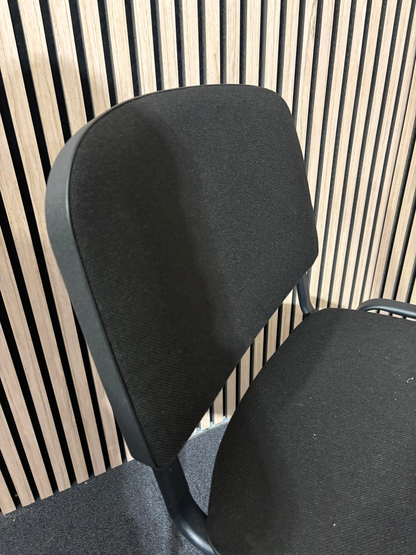 Black fabric plastic frame taurus stacking chair 2425