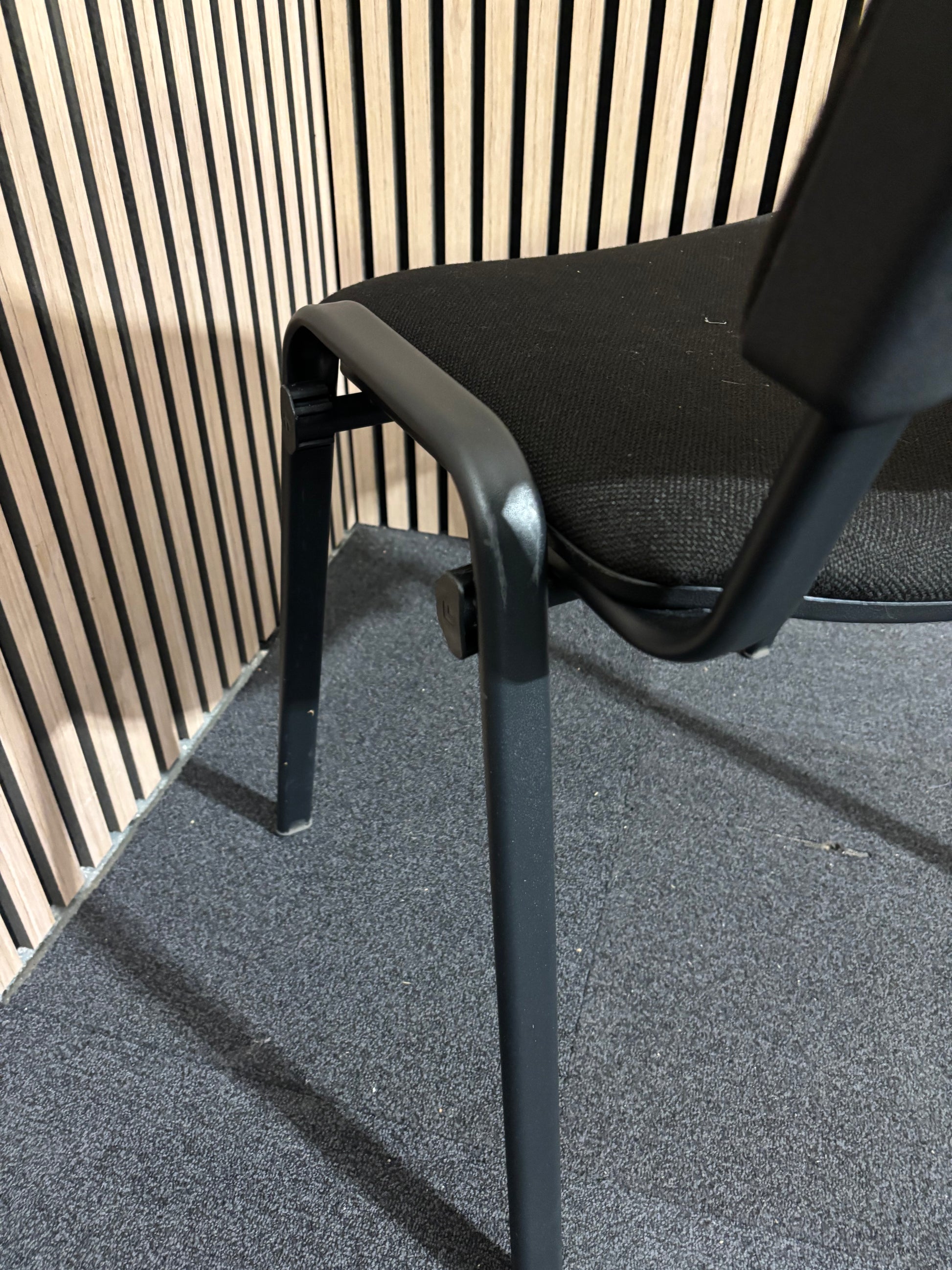 Black fabric plastic frame taurus stacking chair 2425