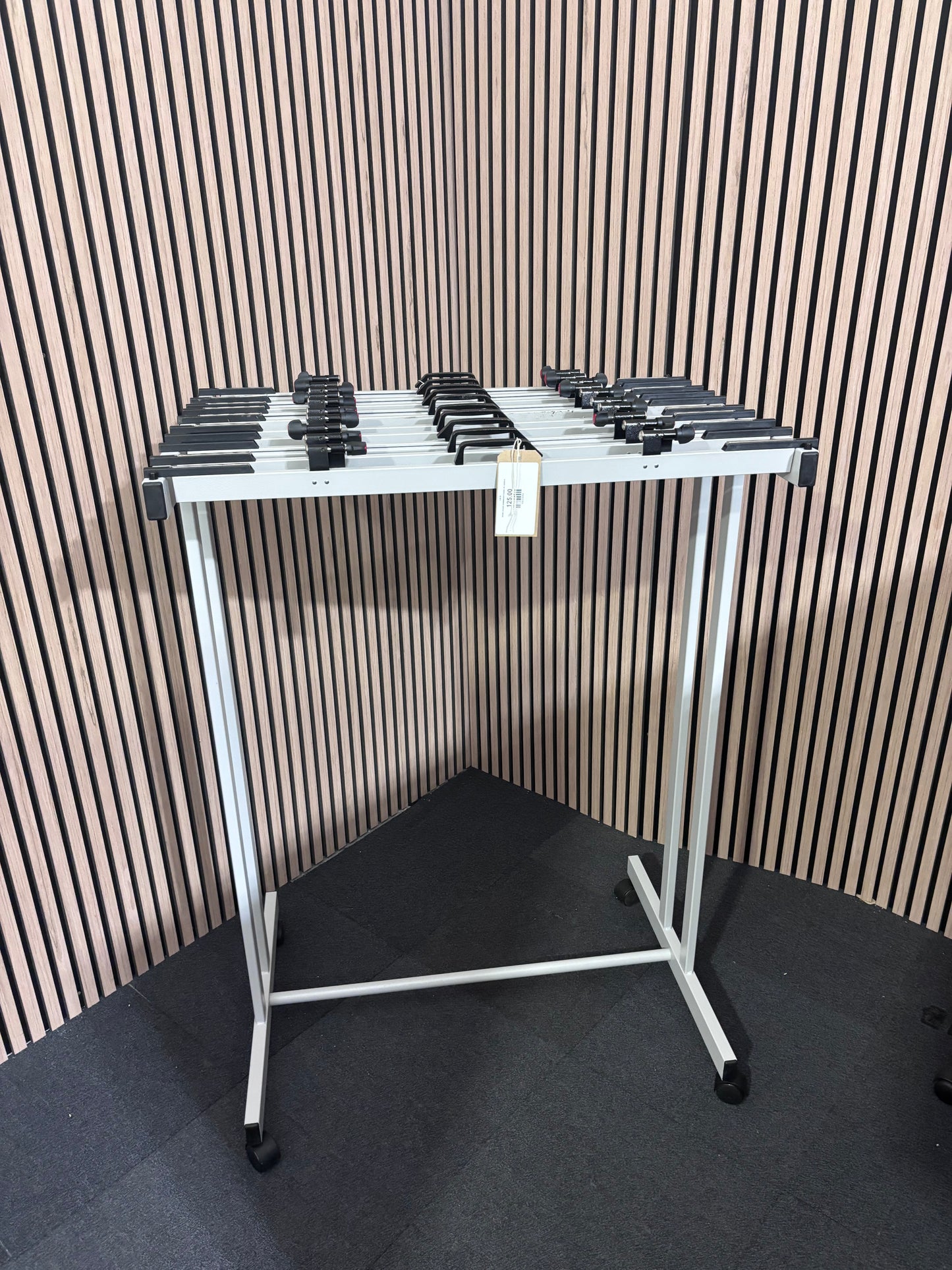 White mobile whiteboard holder on castors