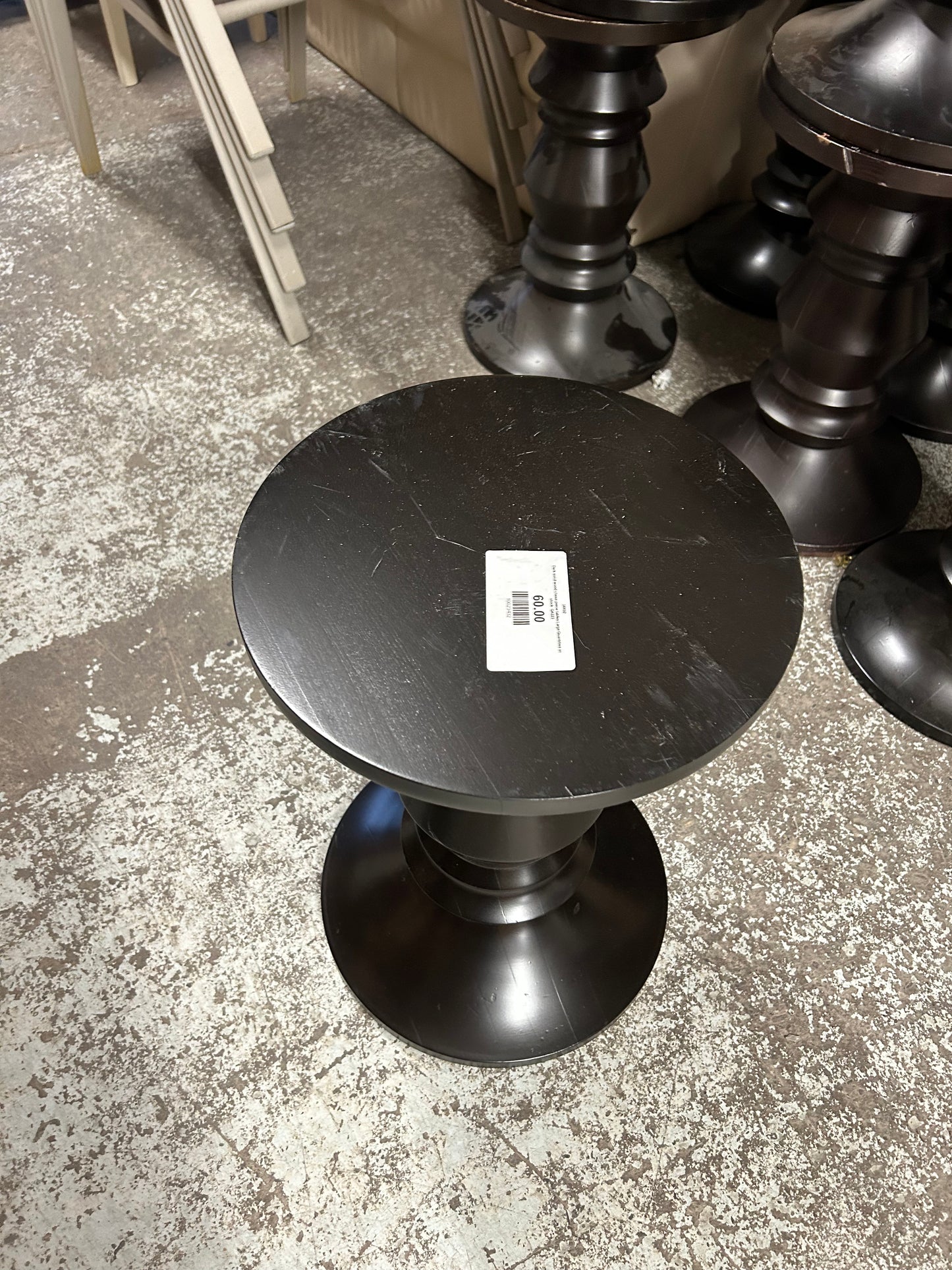 Dark solid wood chess piece tables