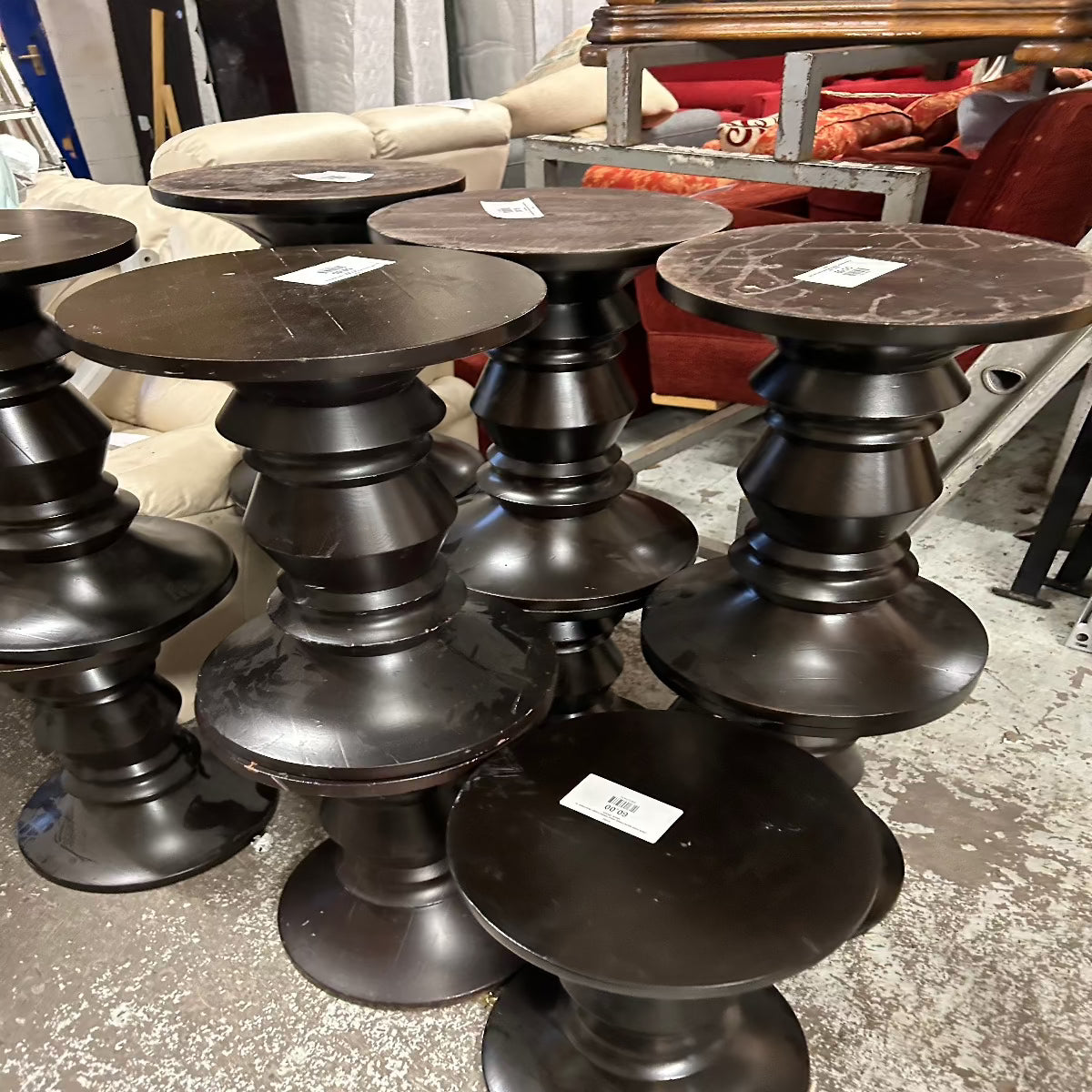 Dark solid wood chess piece tables