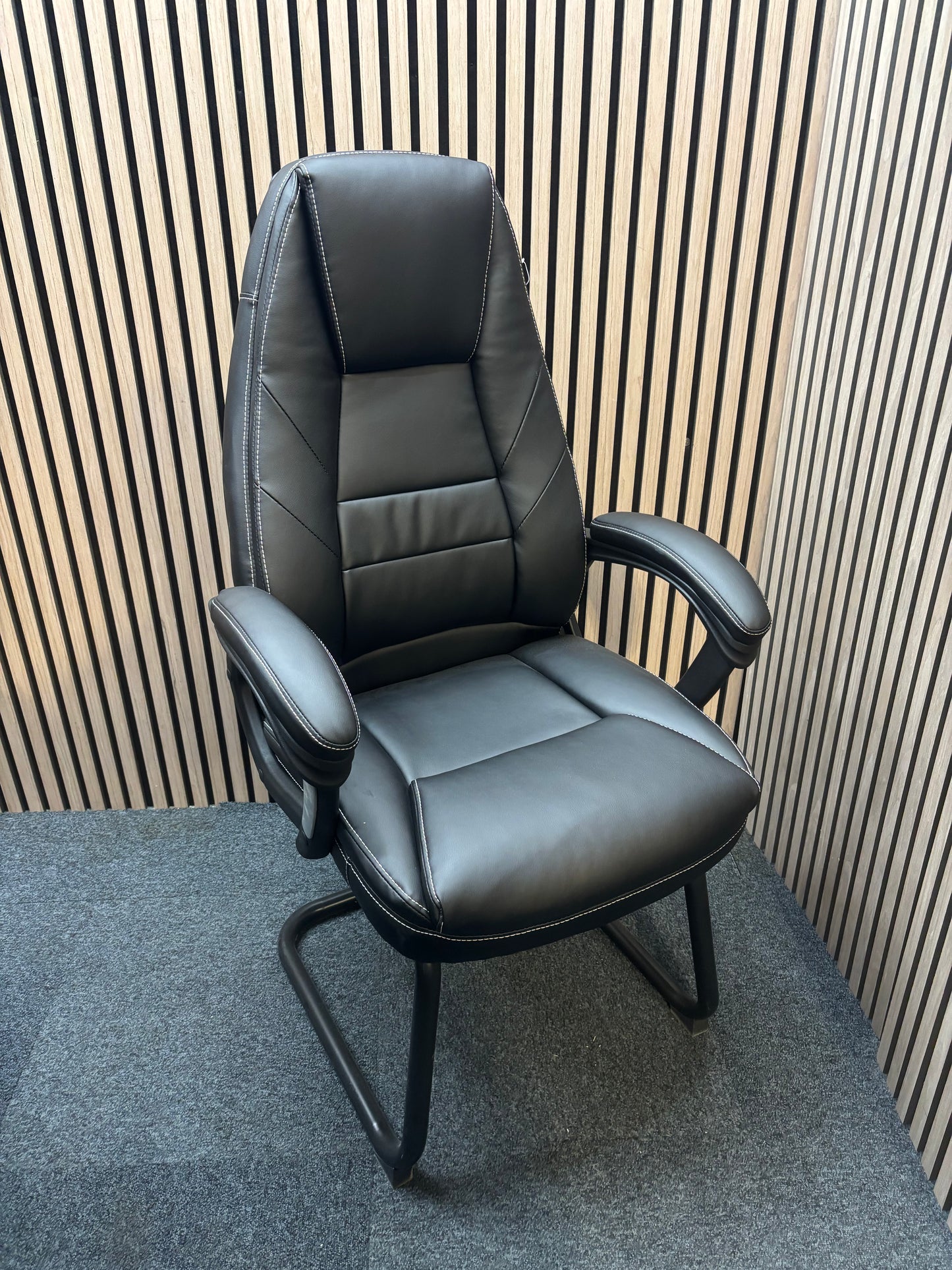 NEW Noble managers cantilever meeting chair with arms, black PU leatherette and black metal cantilever base. Price in VAT