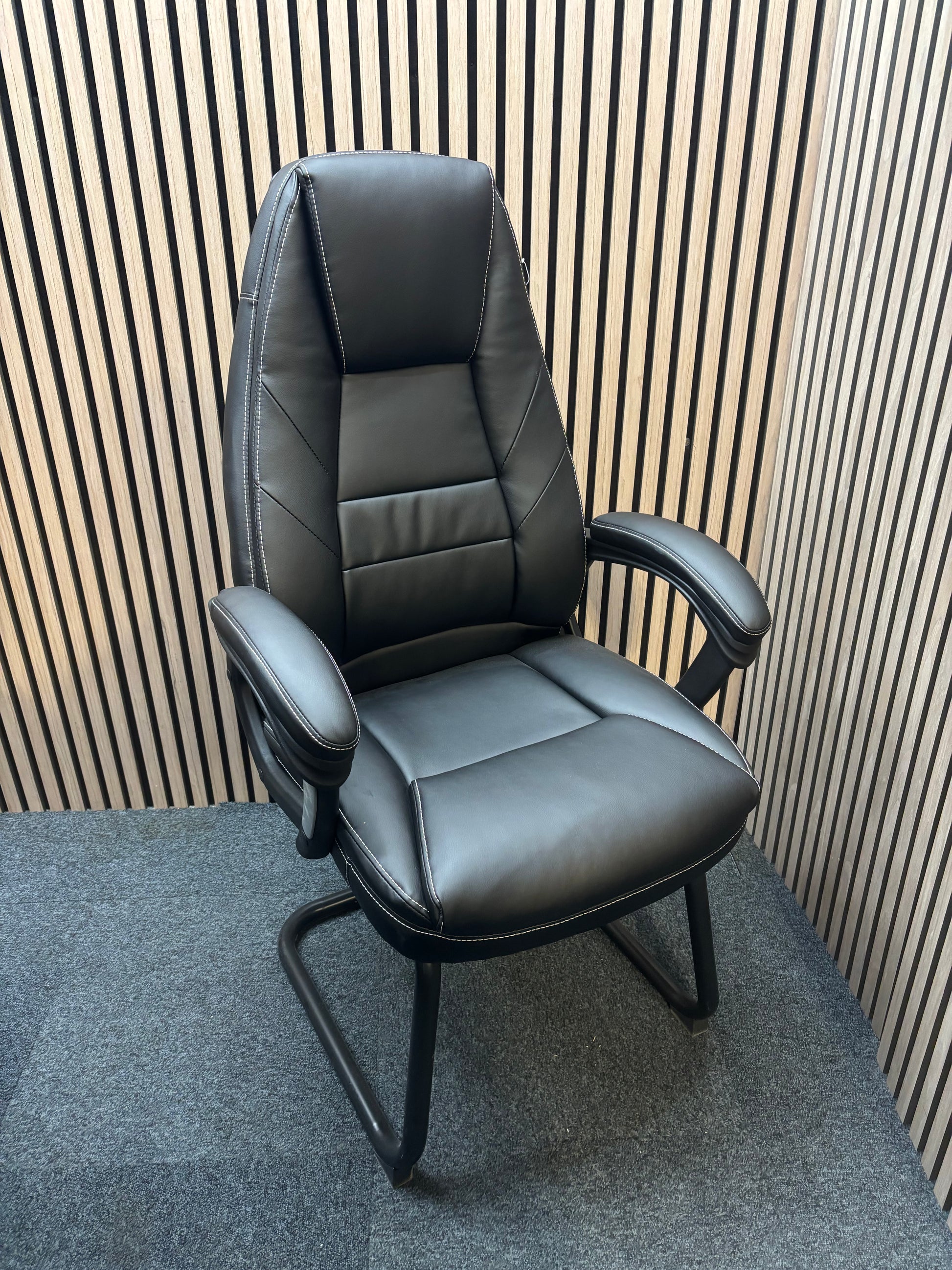 NEW Noble managers cantilever meeting chair with arms, black PU leatherette and black metal cantilever base. Price in VAT