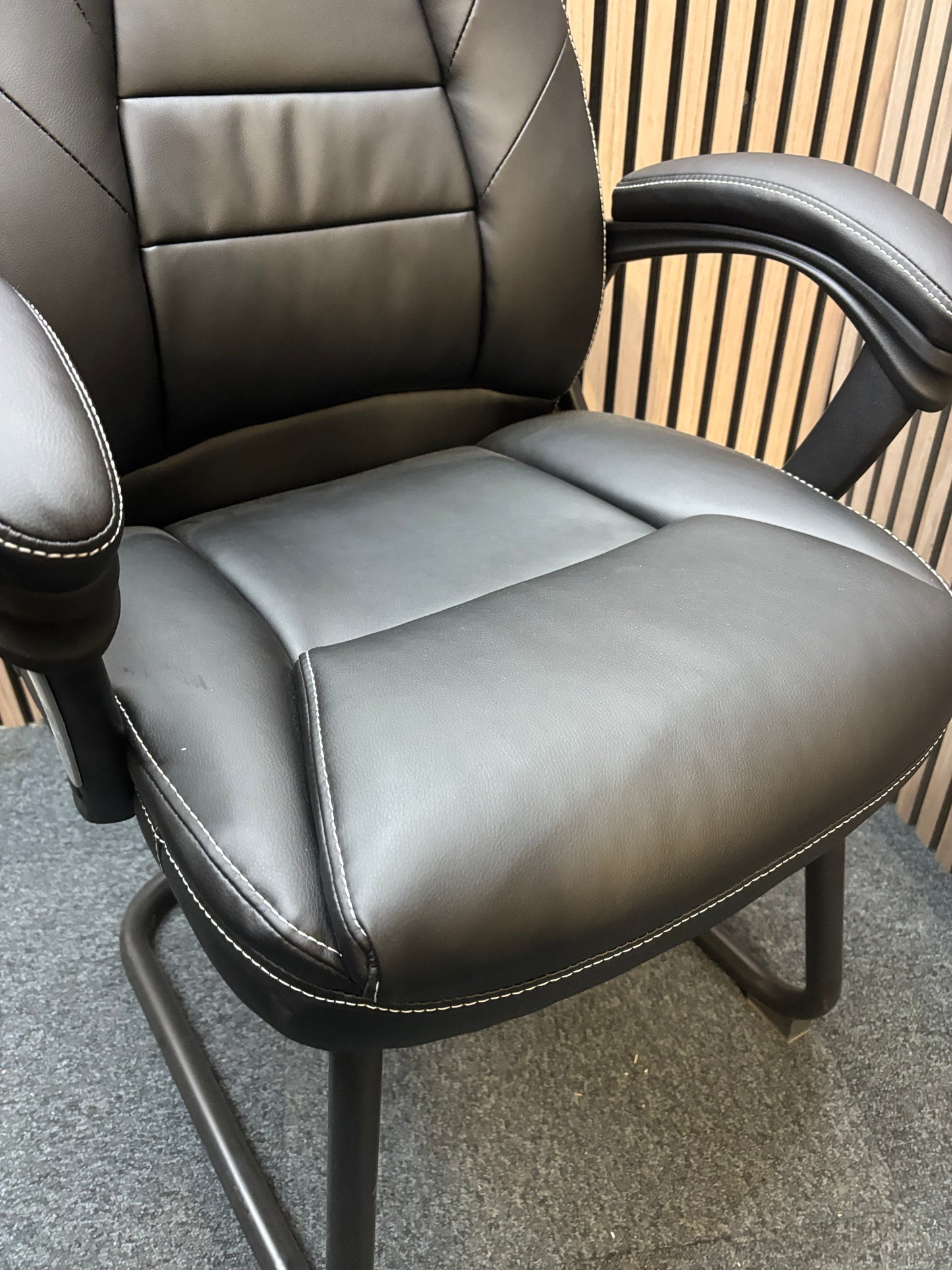NEW Noble managers cantilever meeting chair with arms, black PU leatherette and black metal cantilever base. Price in VAT